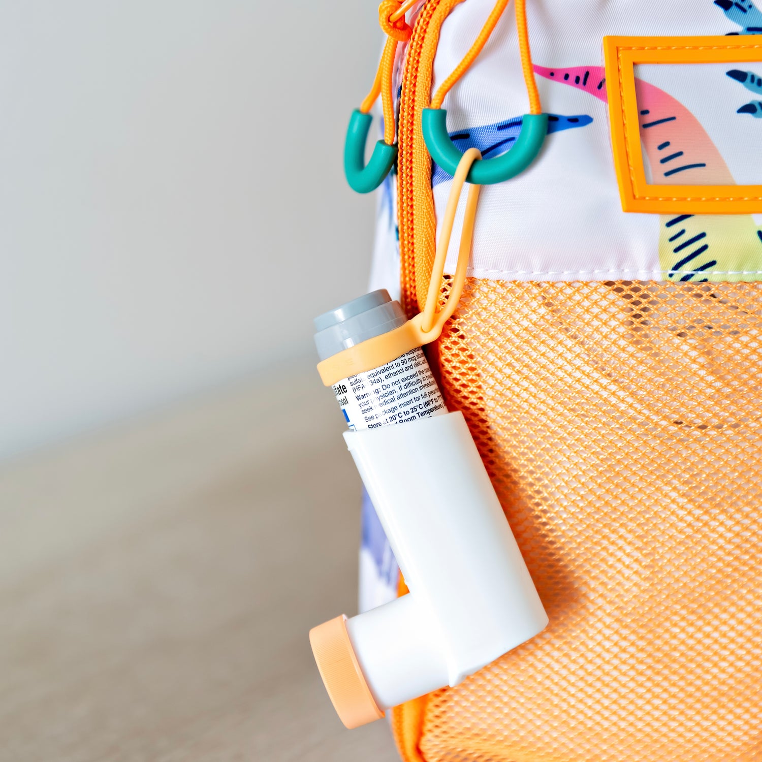 Lip balm holder on inhaler