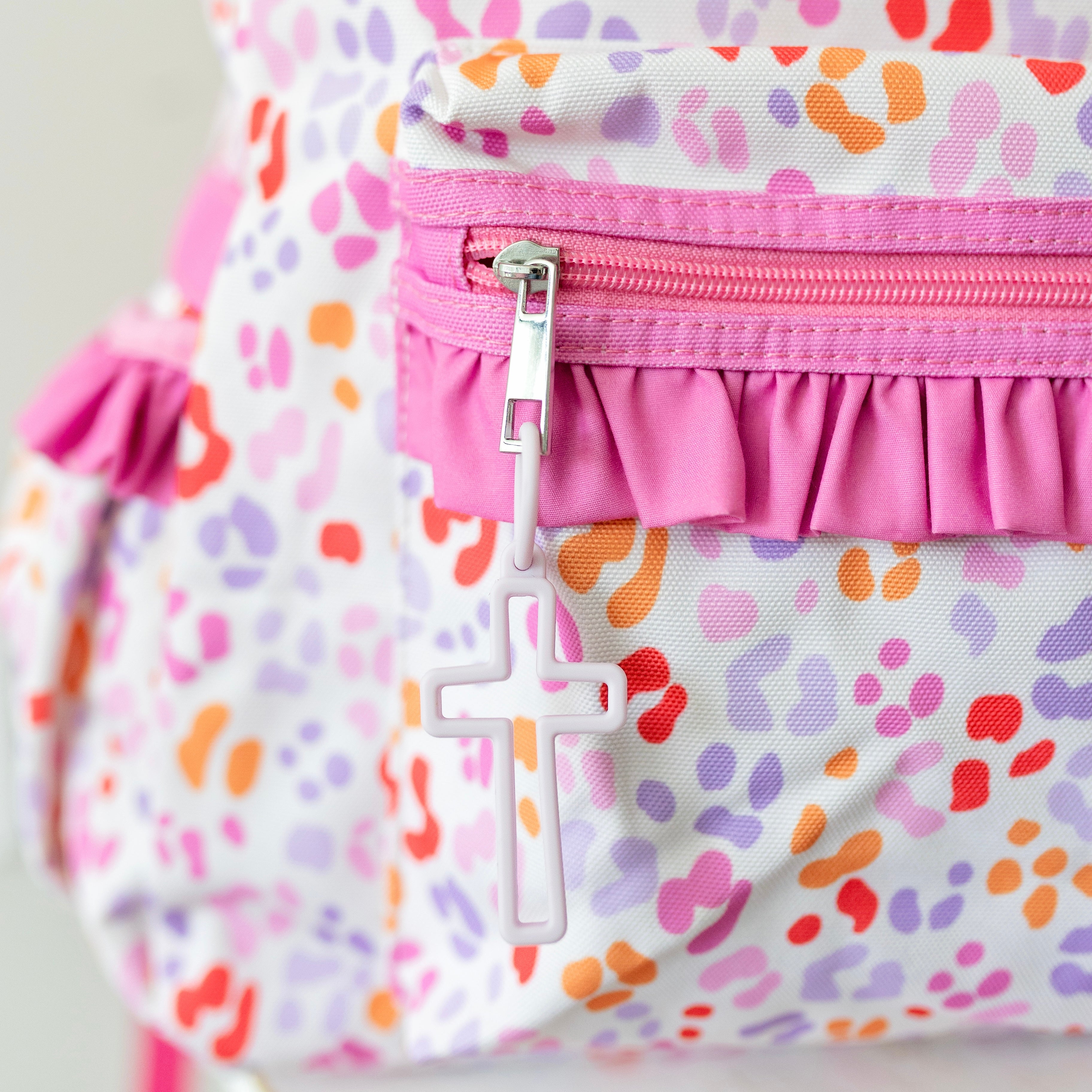 Backpack with cross charm