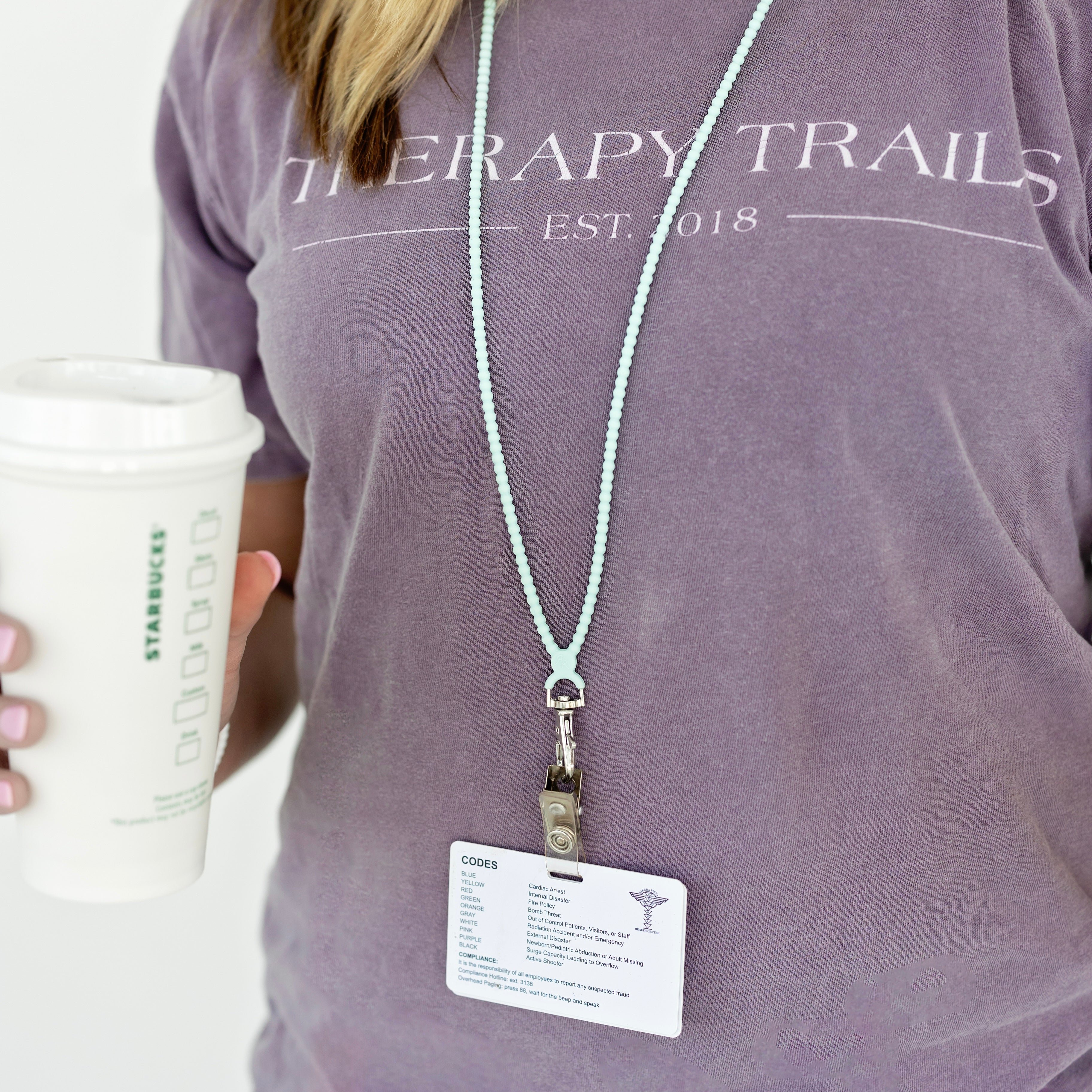 Woman wearing a lanyard