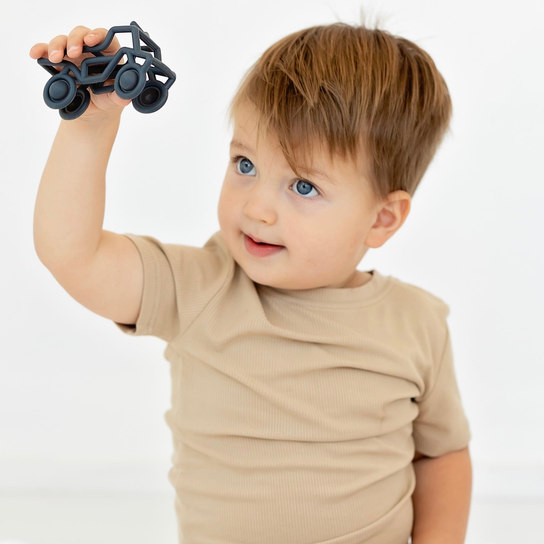 Baby playing with banshee teether