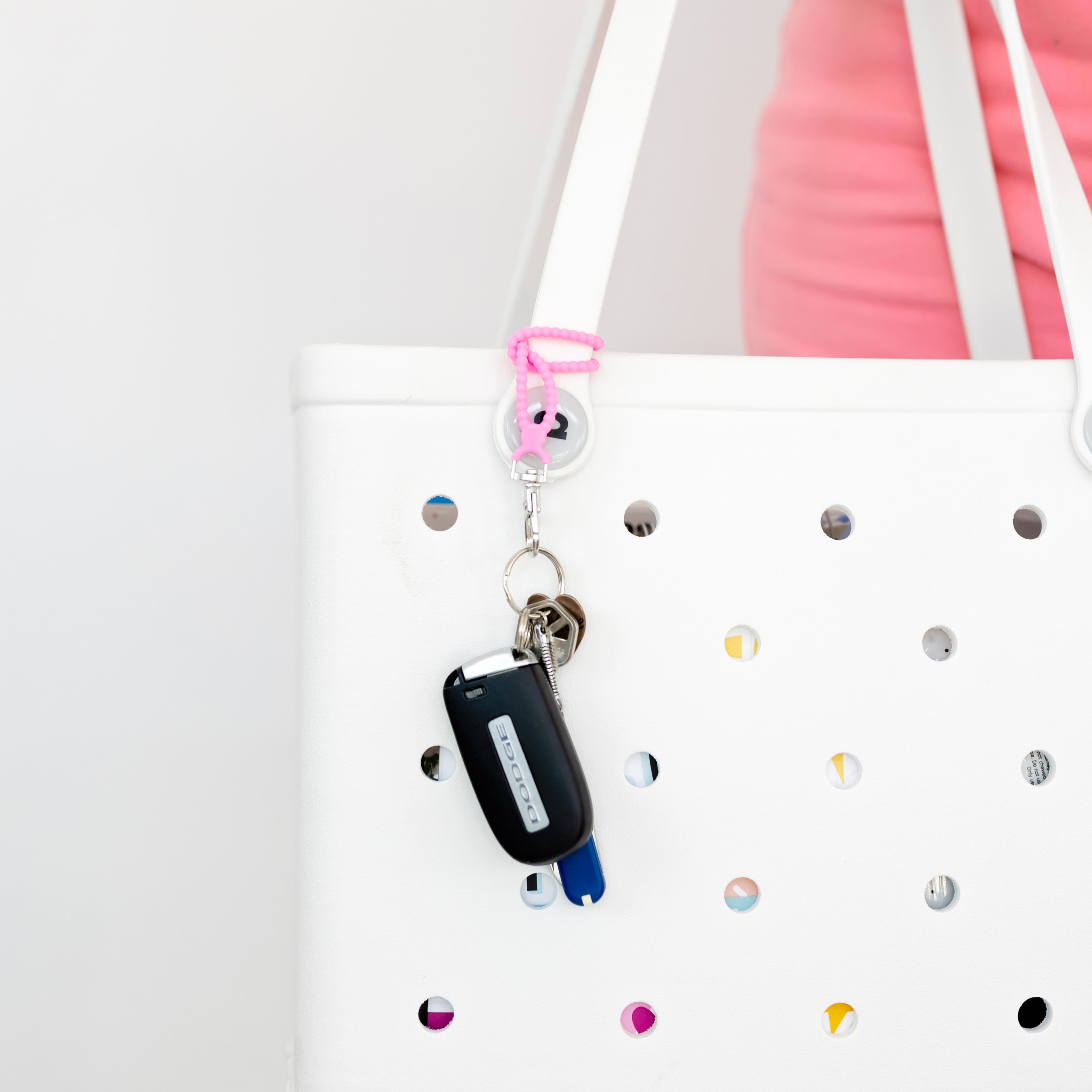 Woman holding a Bogg bag