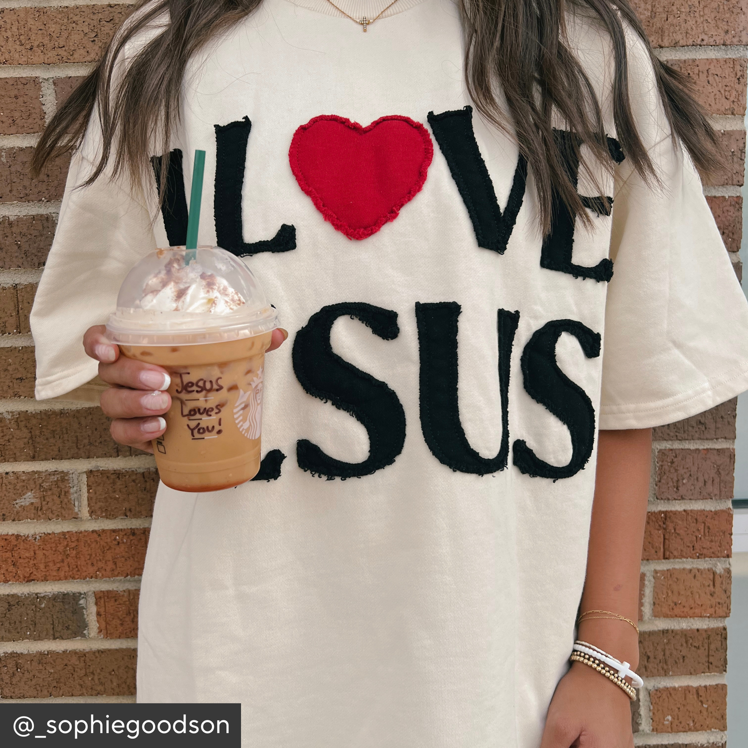 Person wearing a shirt with &