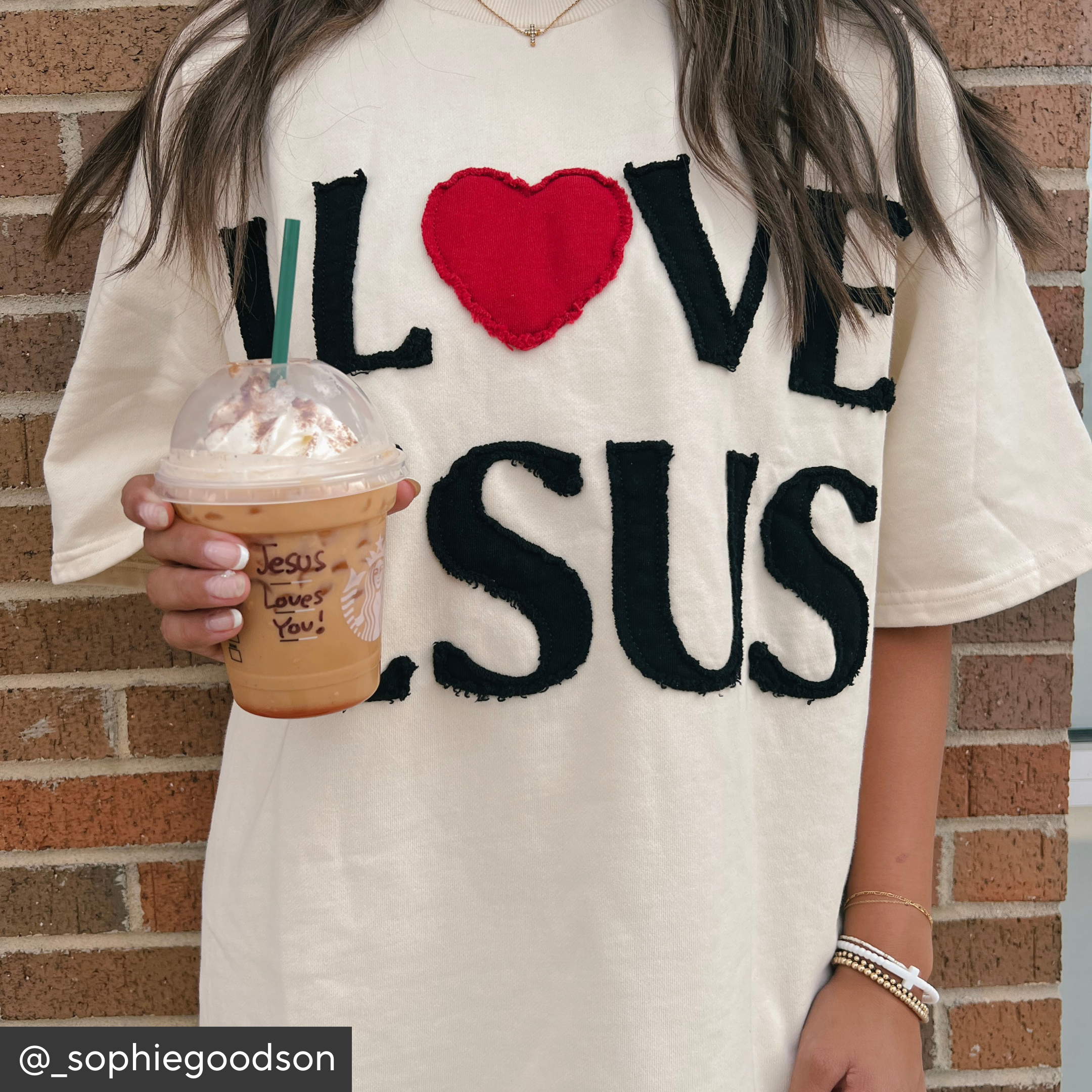 Person wearing a shirt with &