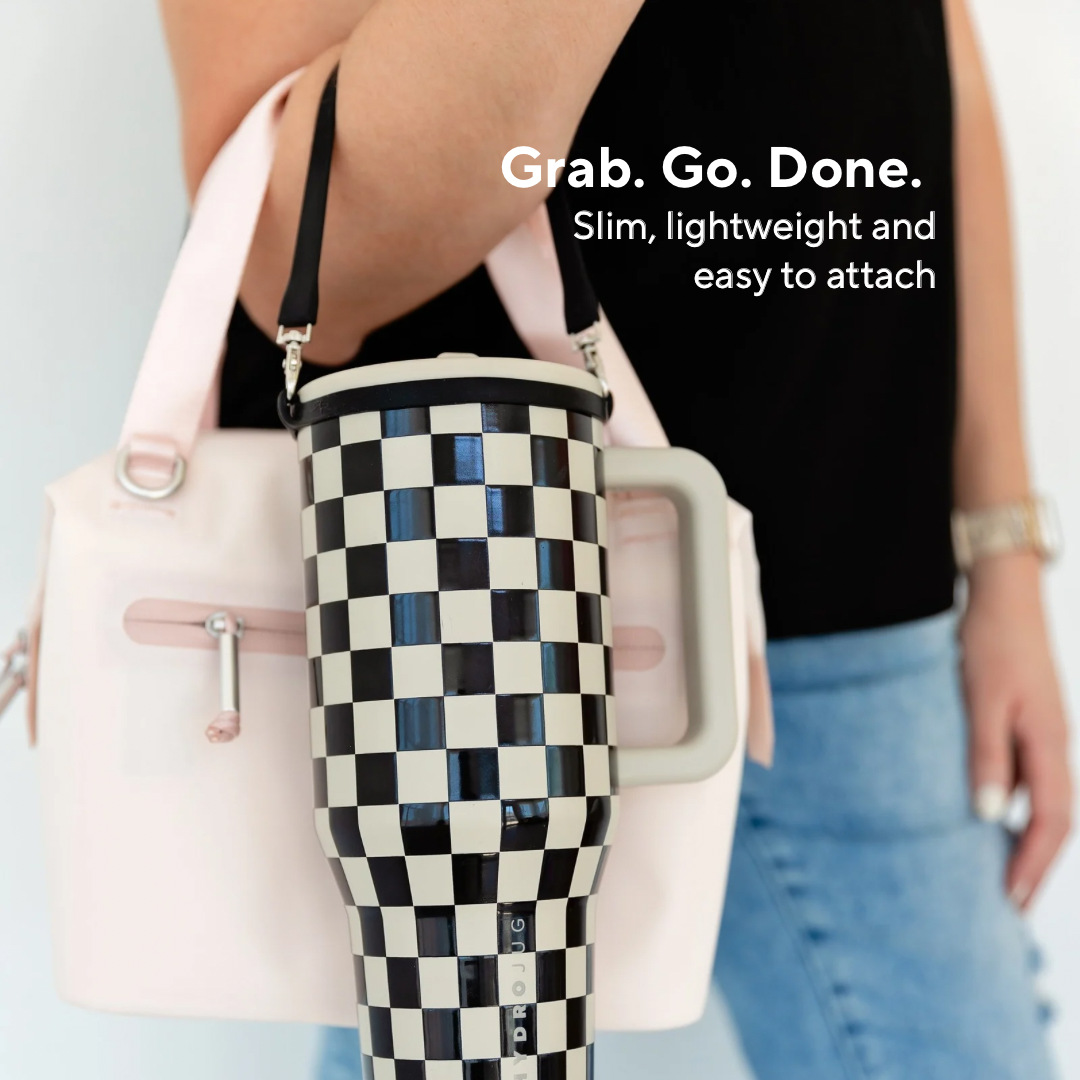 Checkered cup holder attached to a pink bag with text &