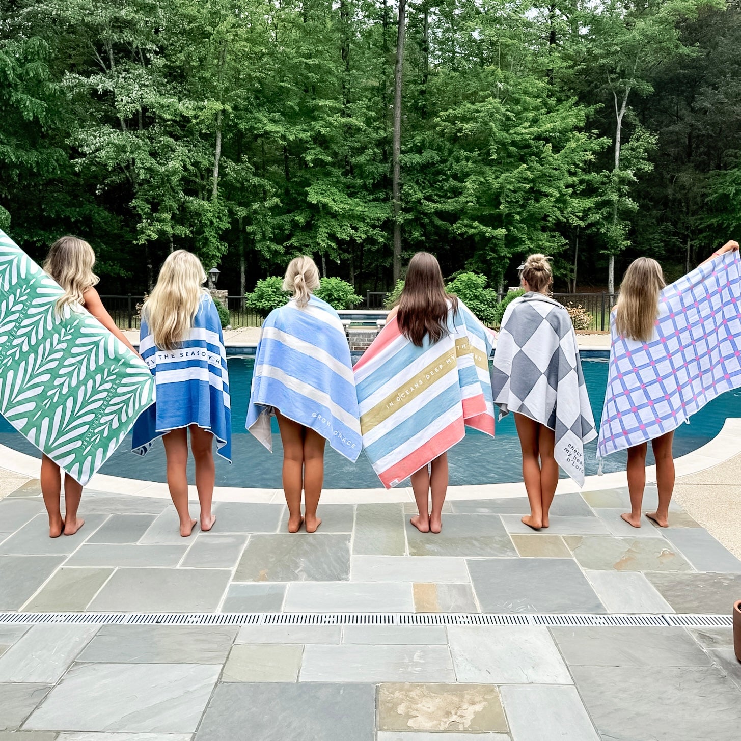 Kids with beach towels