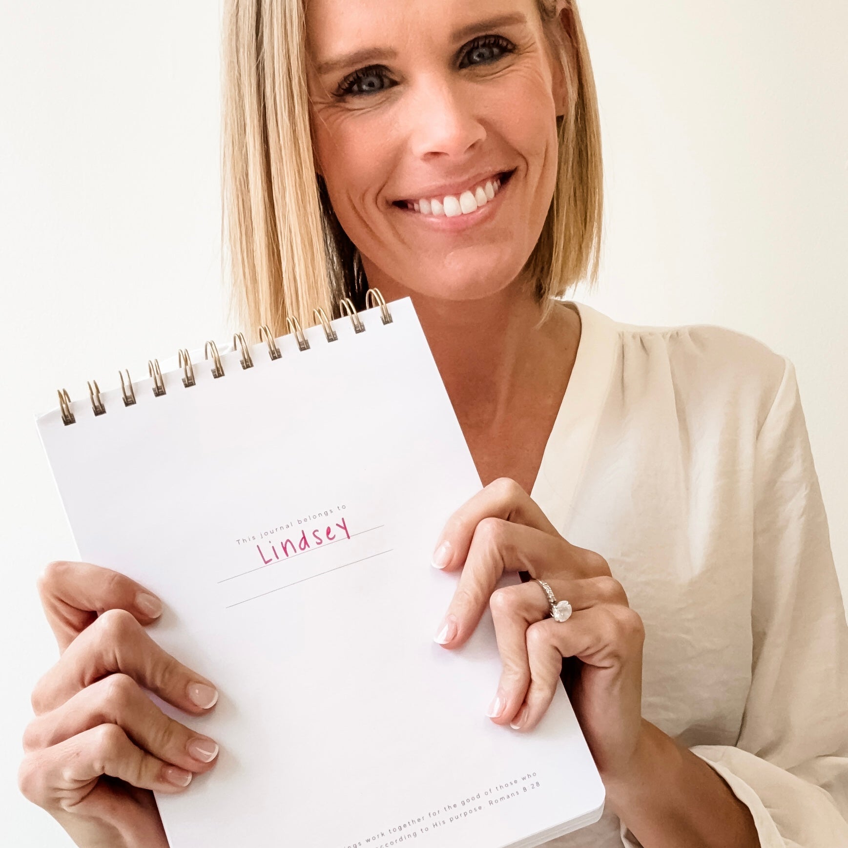Woman holding journal