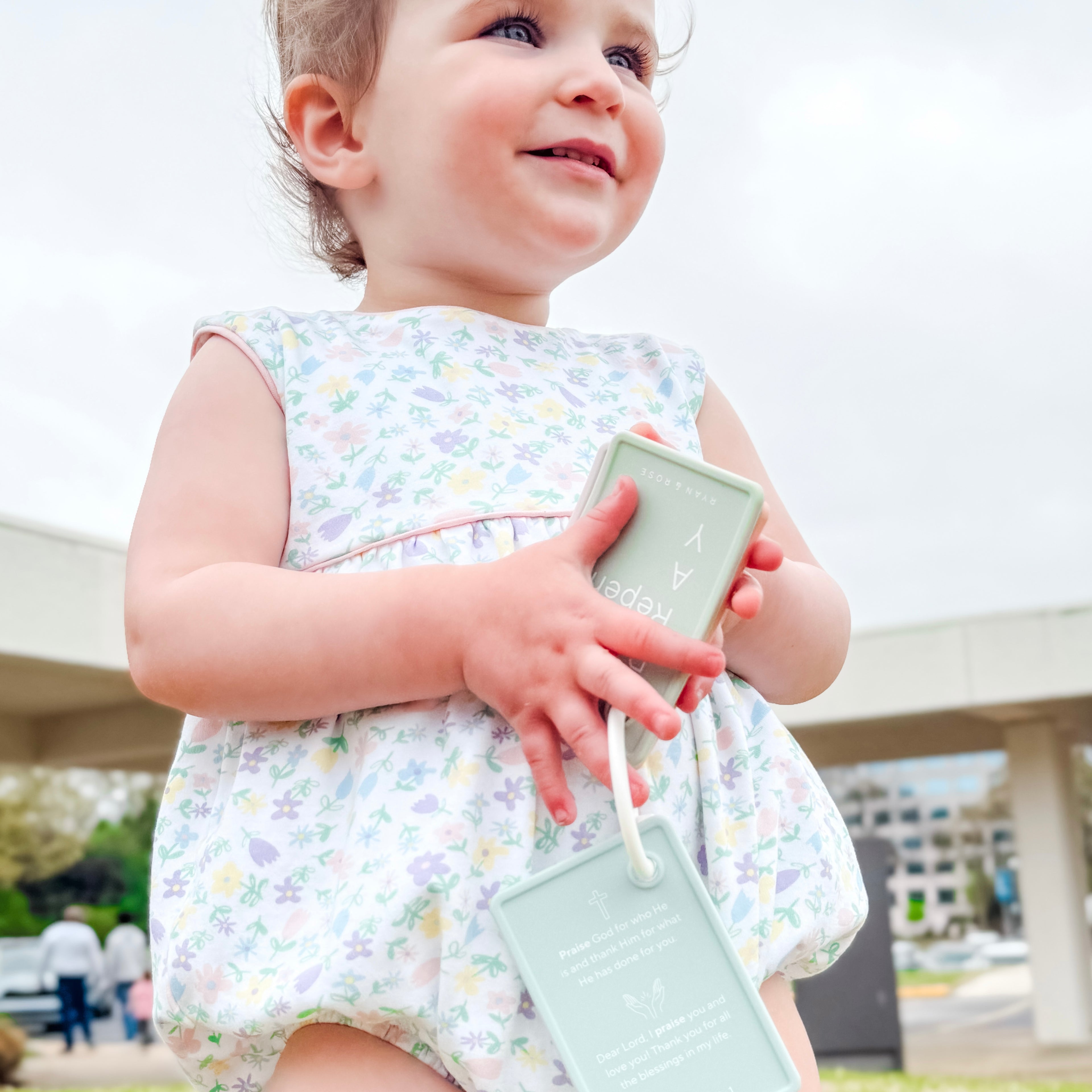 Child with pray flashcards