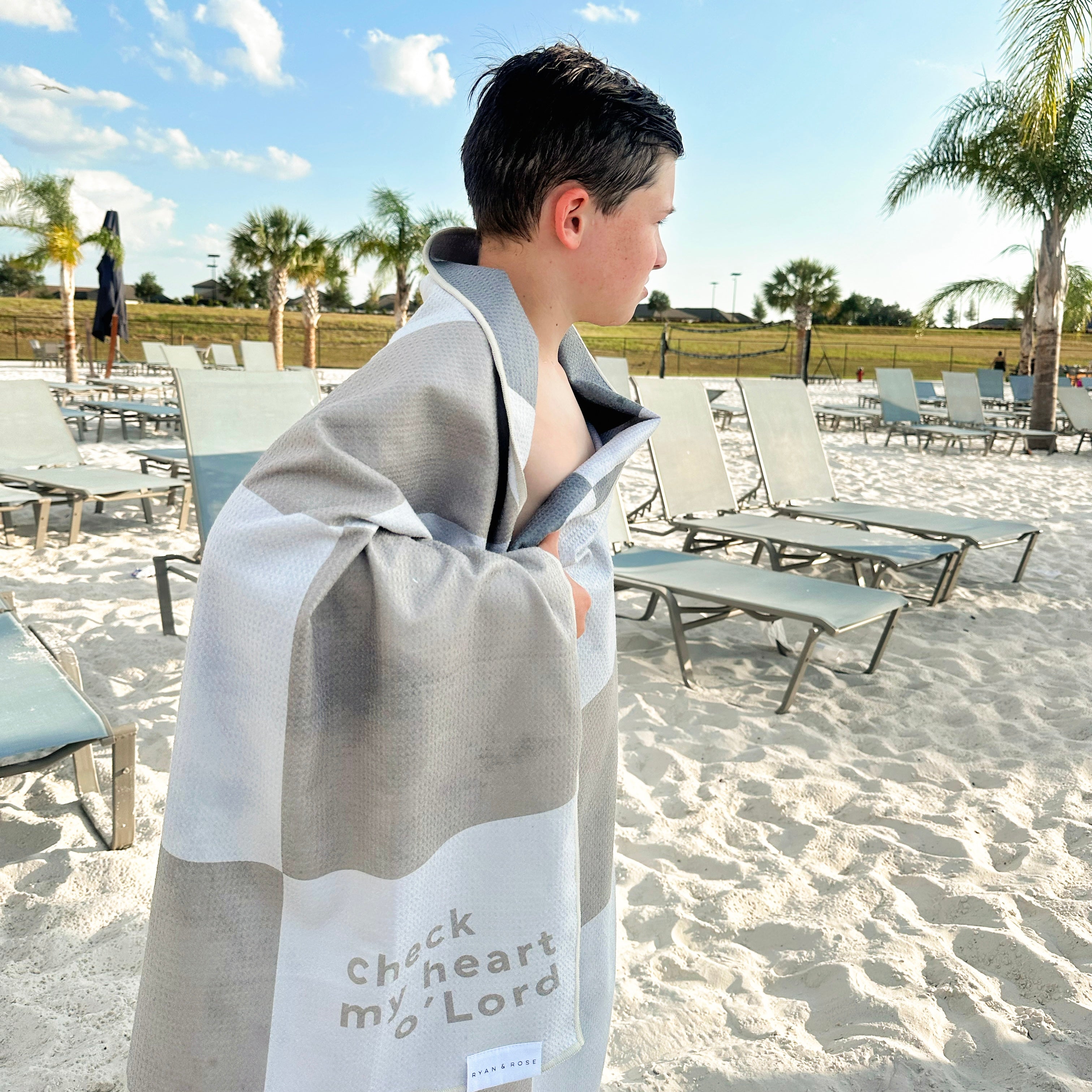 Kid with beach towel