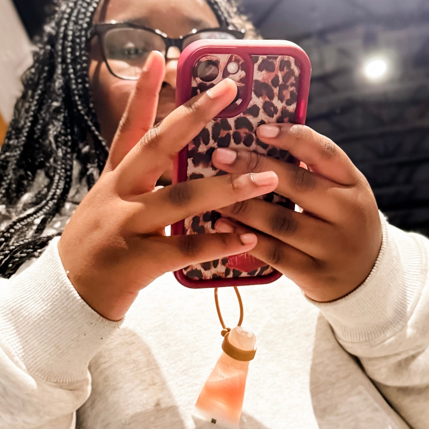 Lil balm holder on phone case