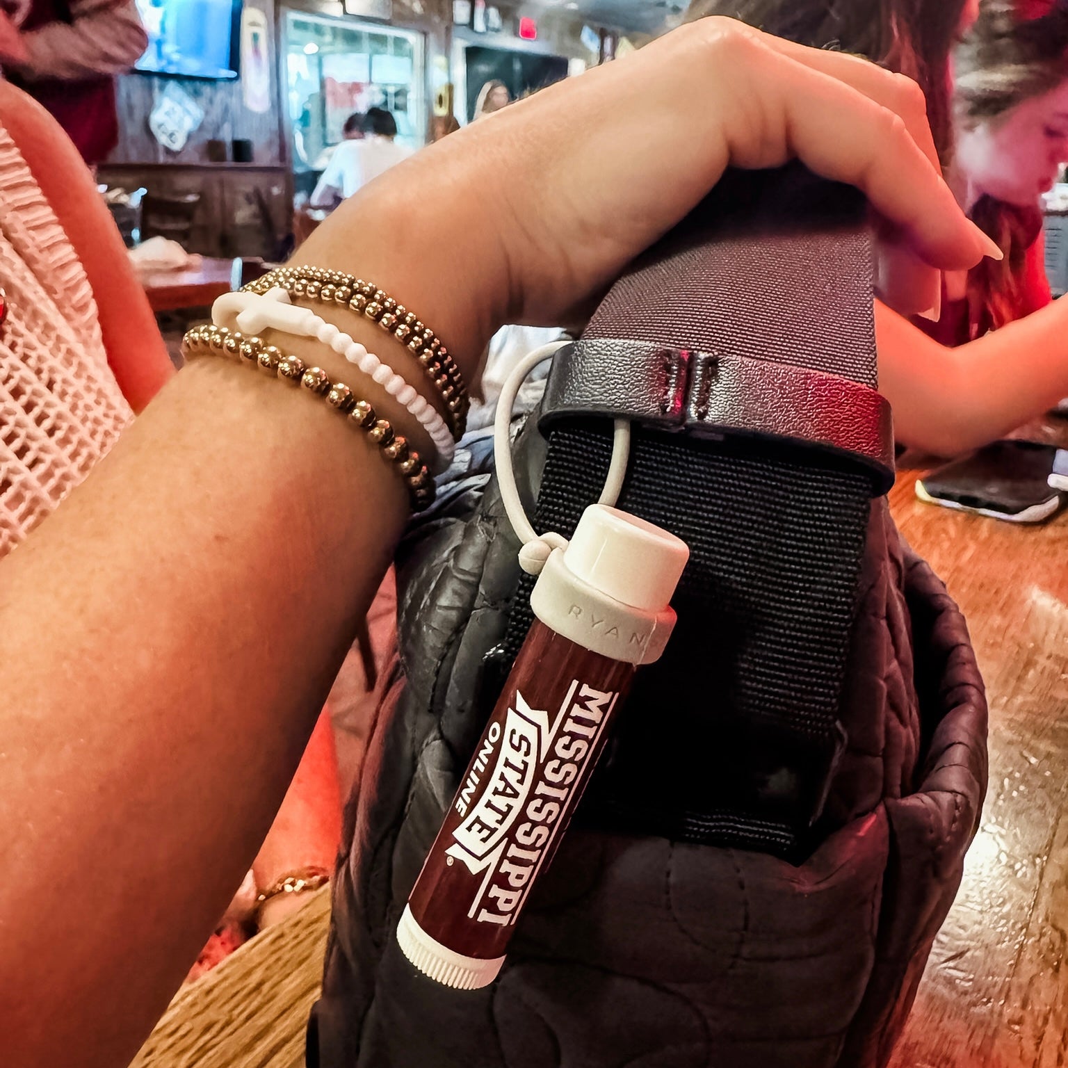 Lip balm on purse