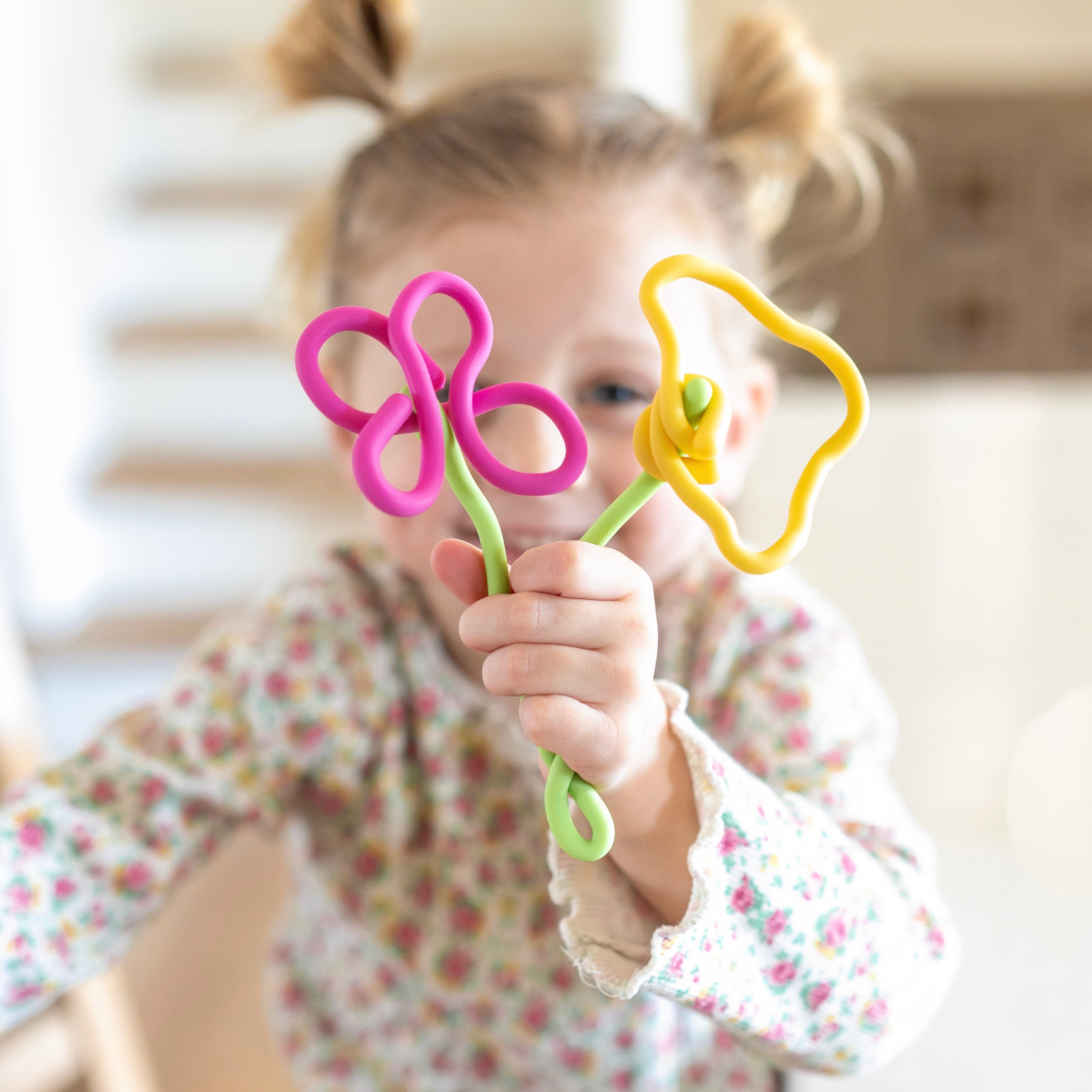 Girl playing with Imagination Sticks