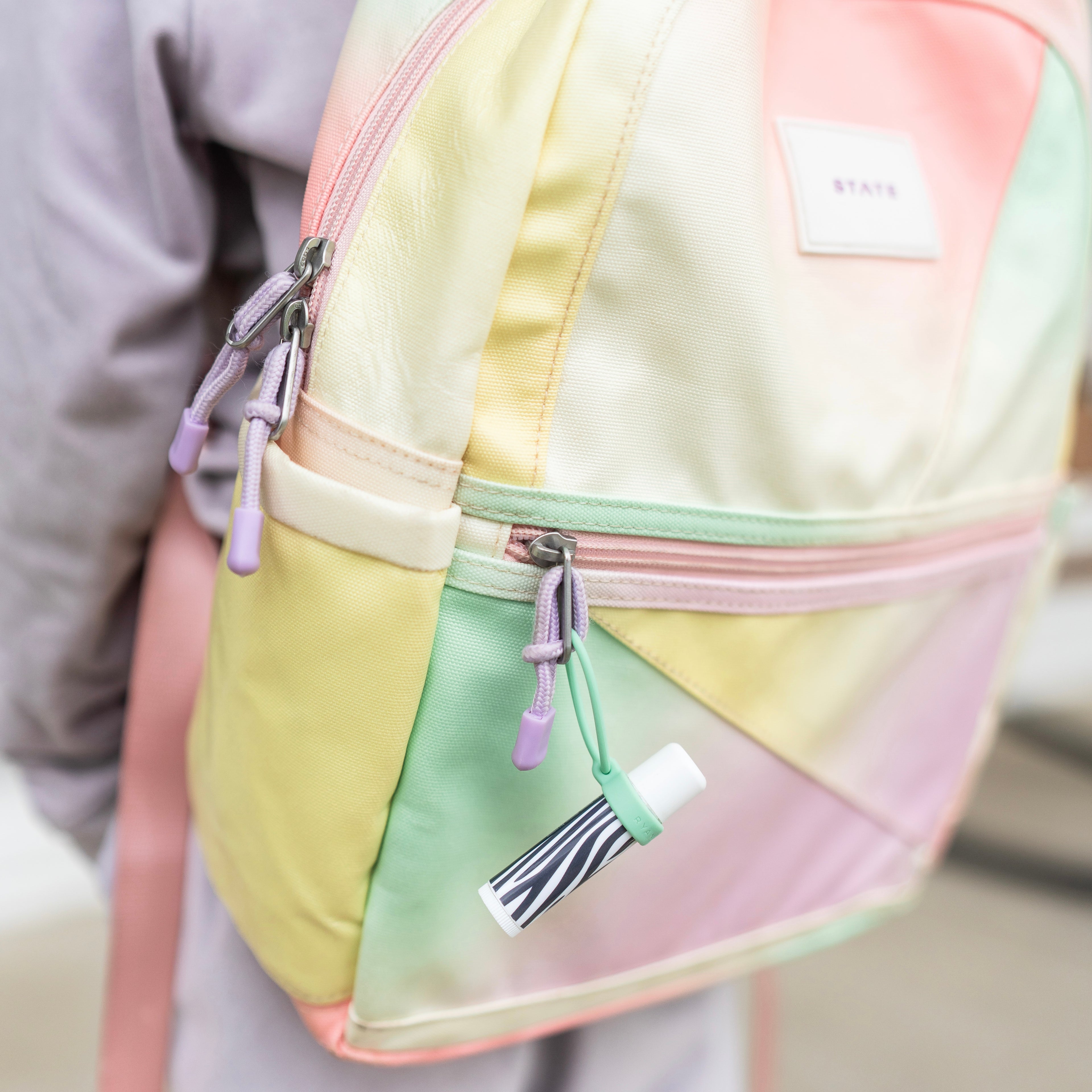 Lip balm on backpack