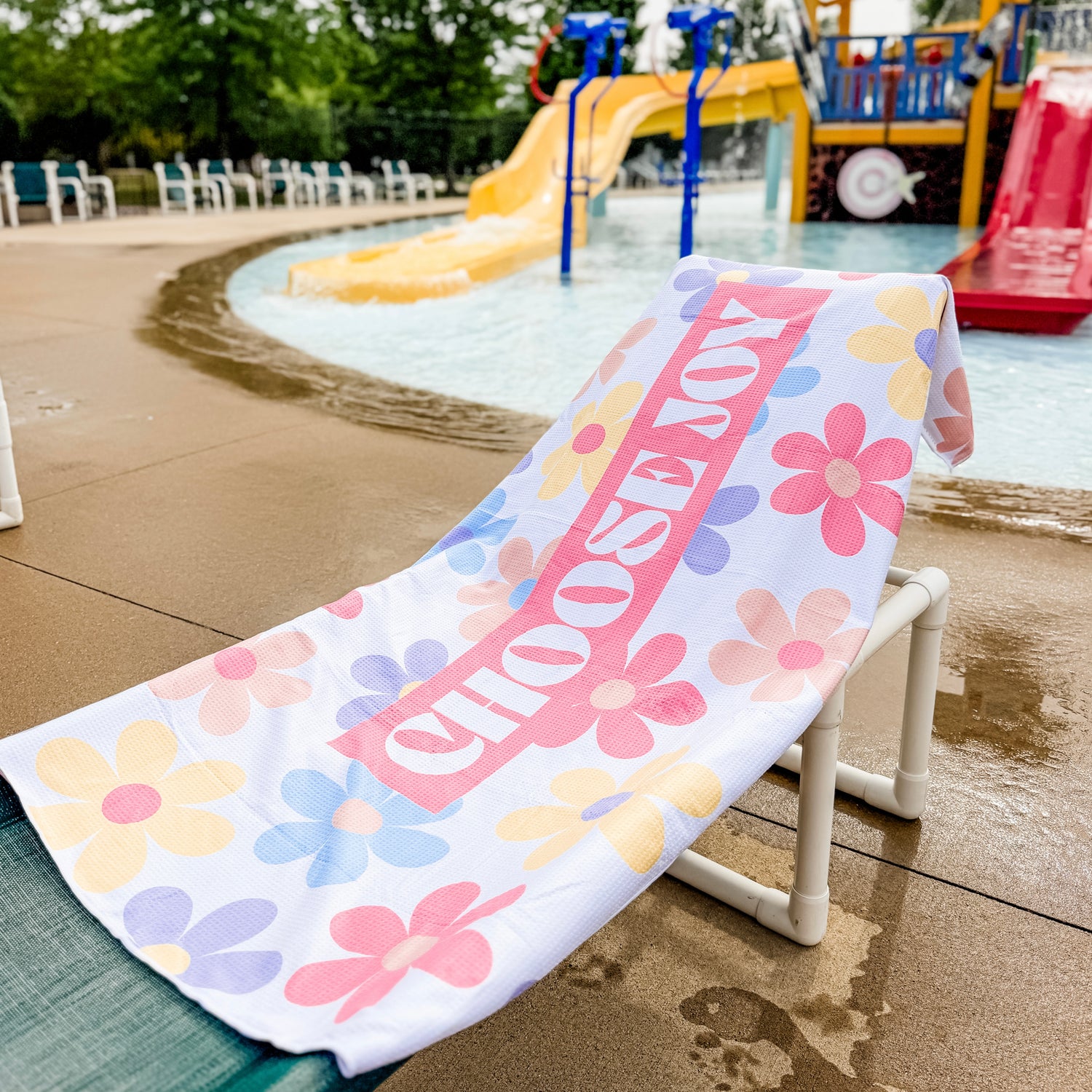 Floral-patterned towel with &