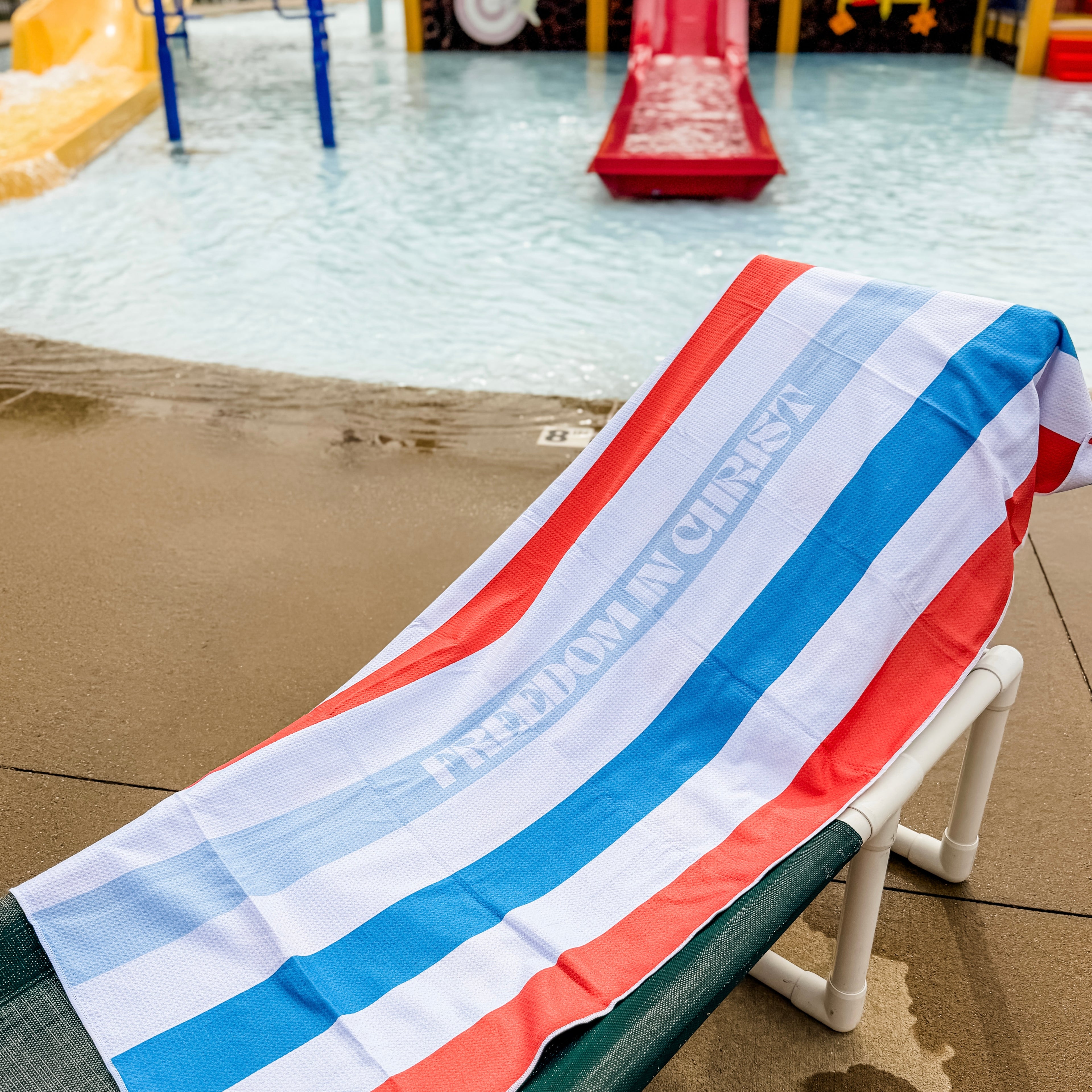 Striped beach towel with &