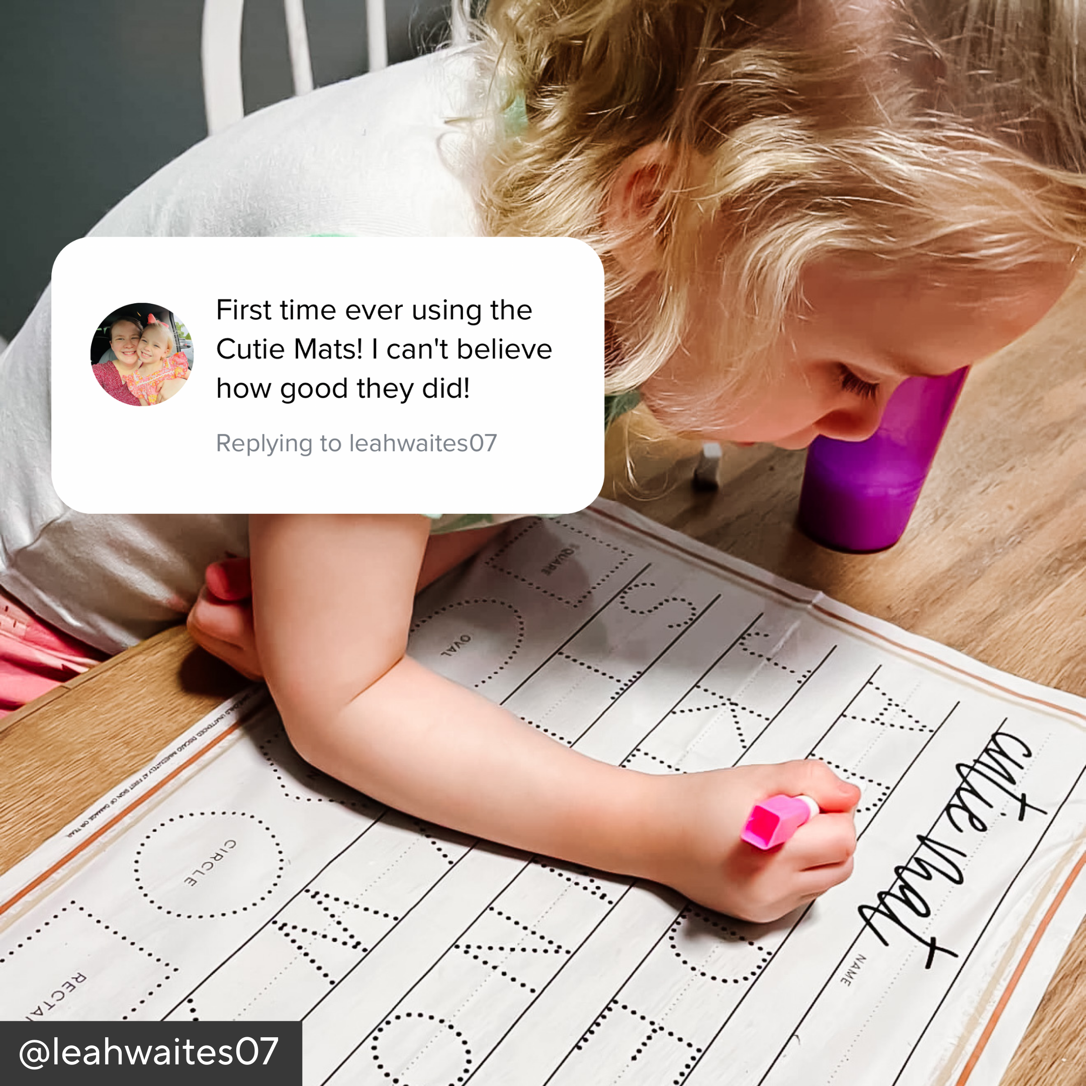 Child using a cutie mat for writing practice with a positive comment overlay.