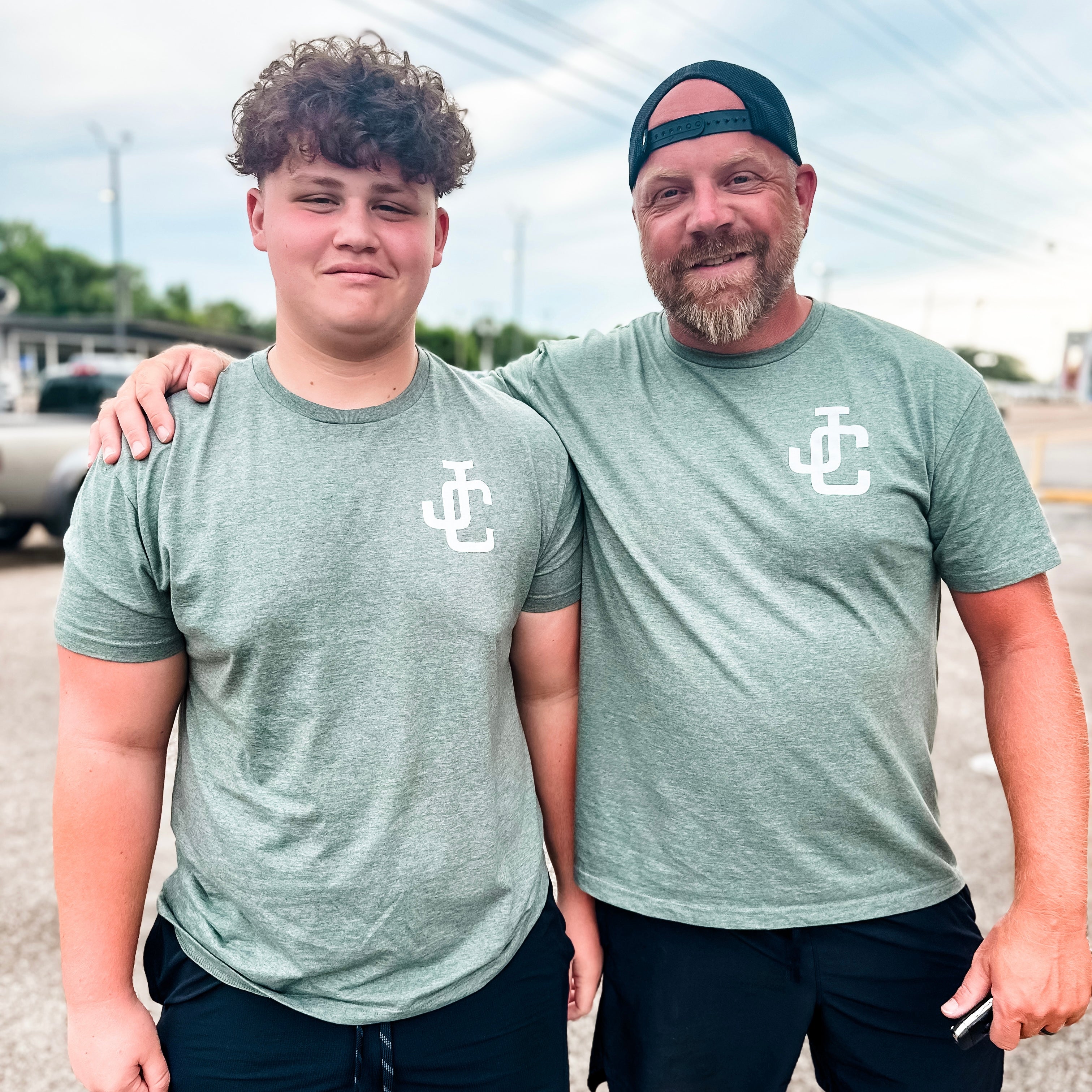 Men wearing JC shirt