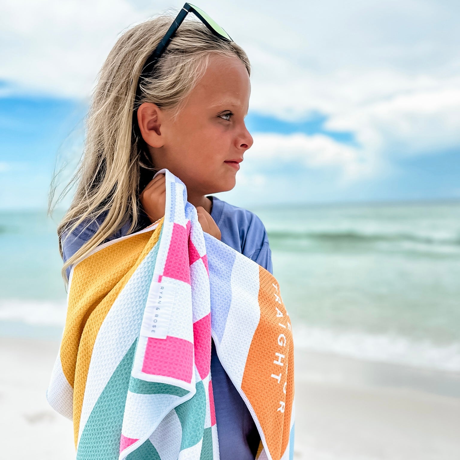 Girl wrapped in beach towel