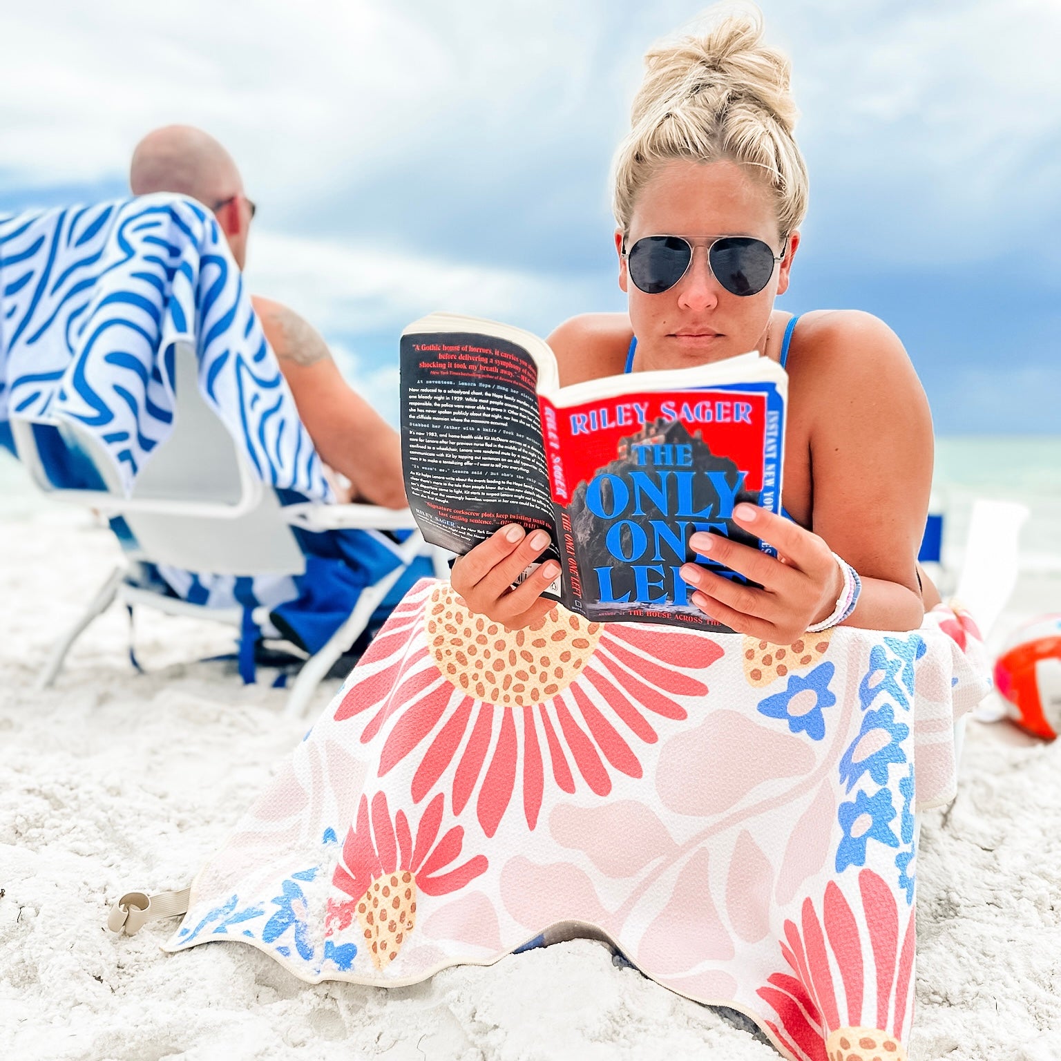 People with beach towels