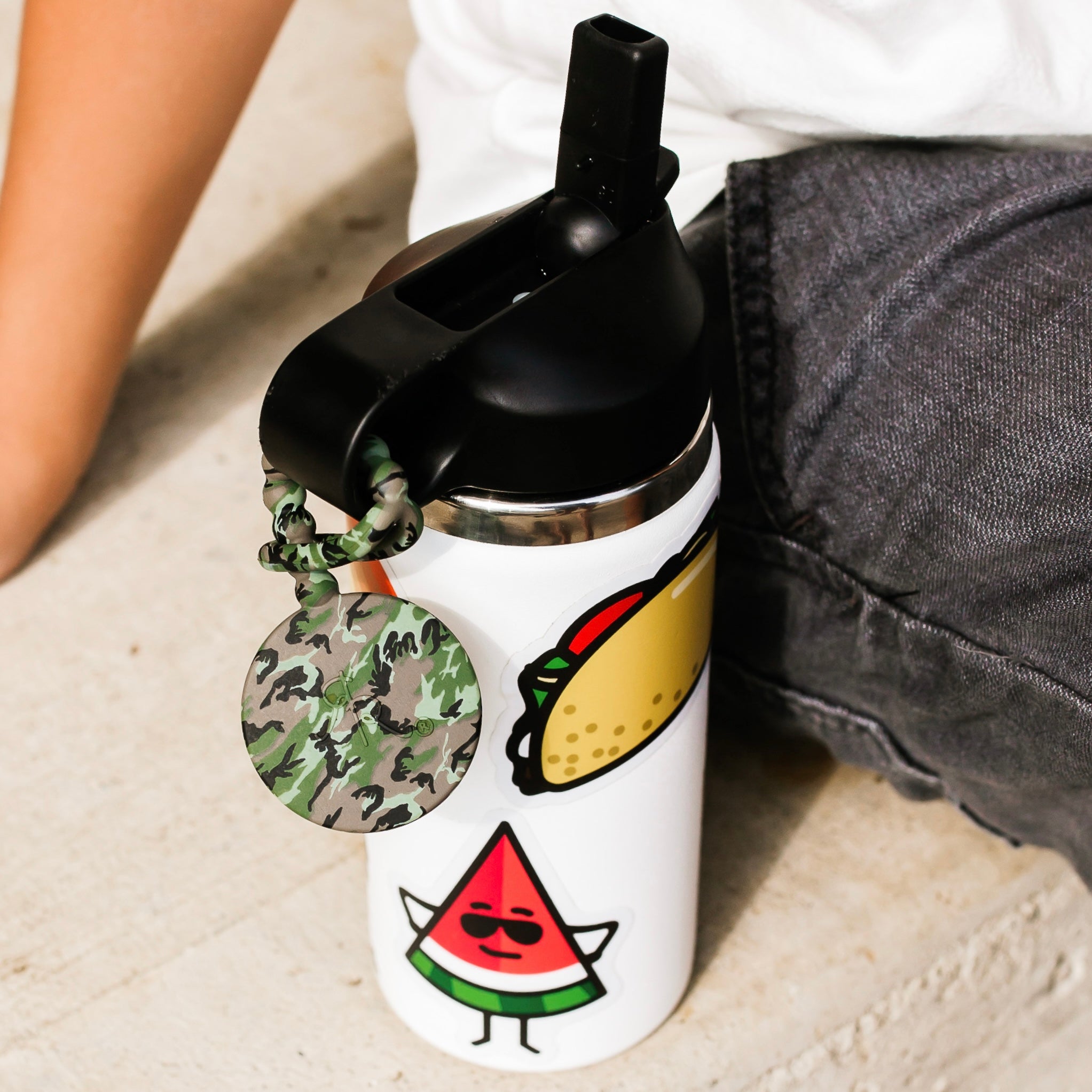 Water bottle with a Cutie Tag attached.