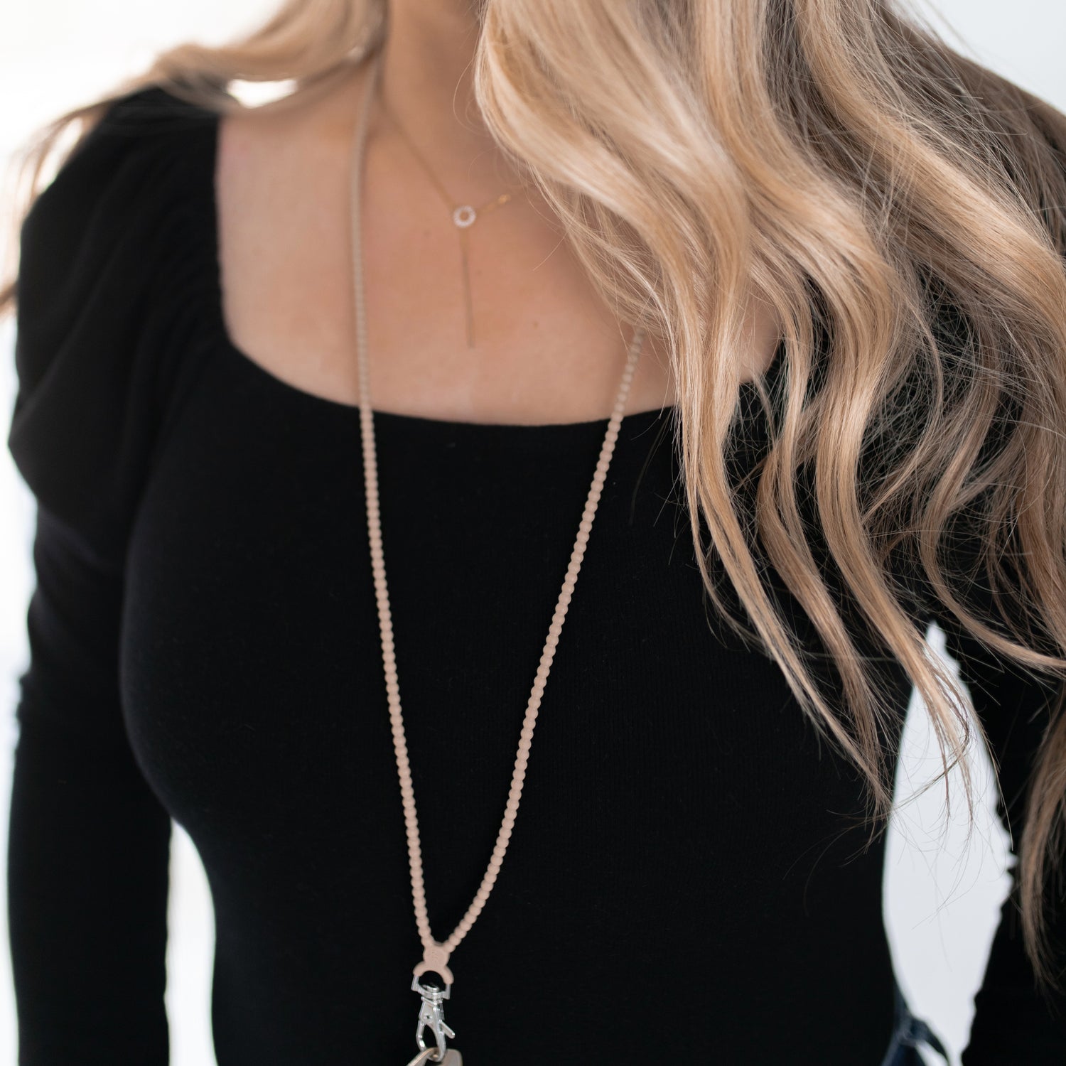 Woman wearing a lanyard