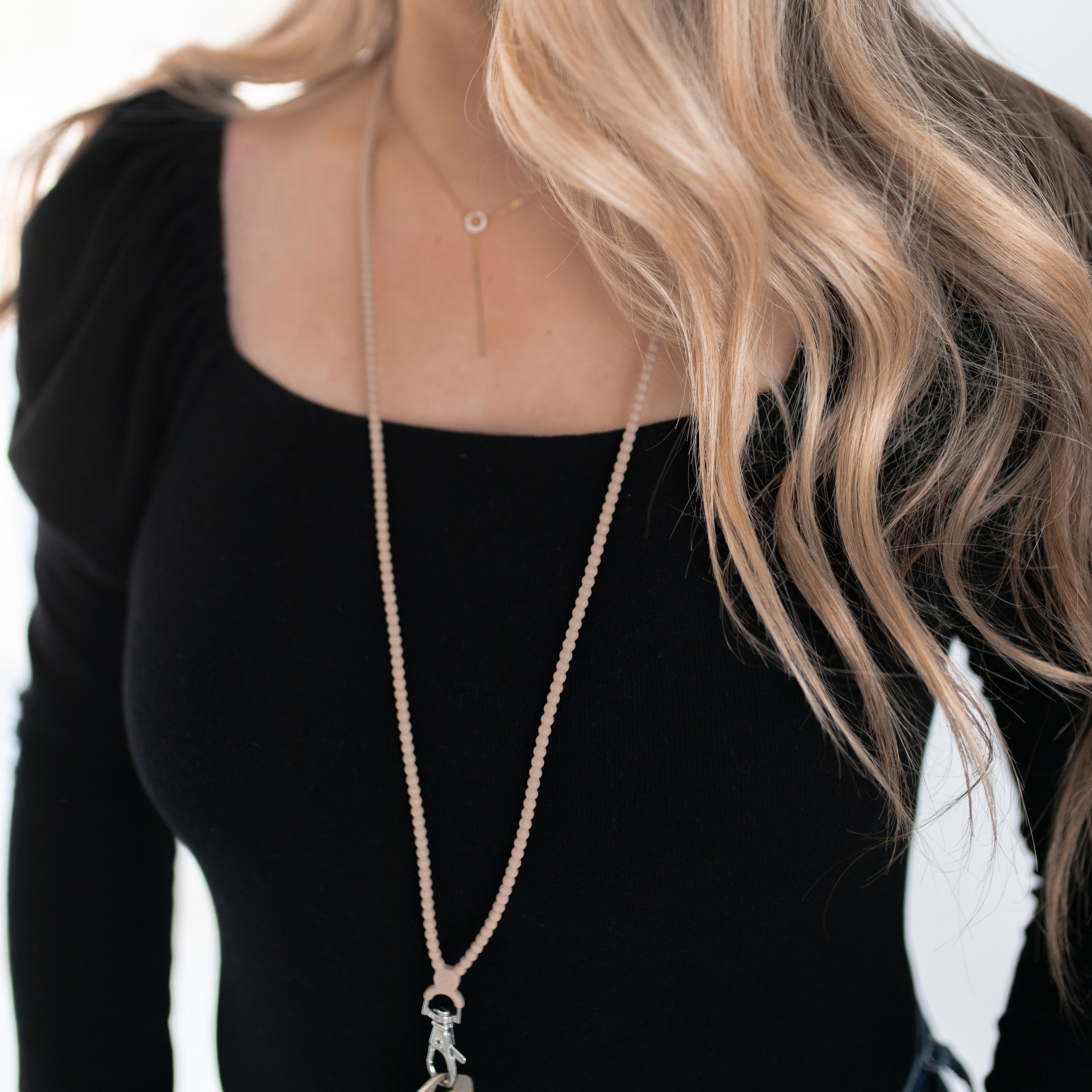 Woman wearing a lanyard