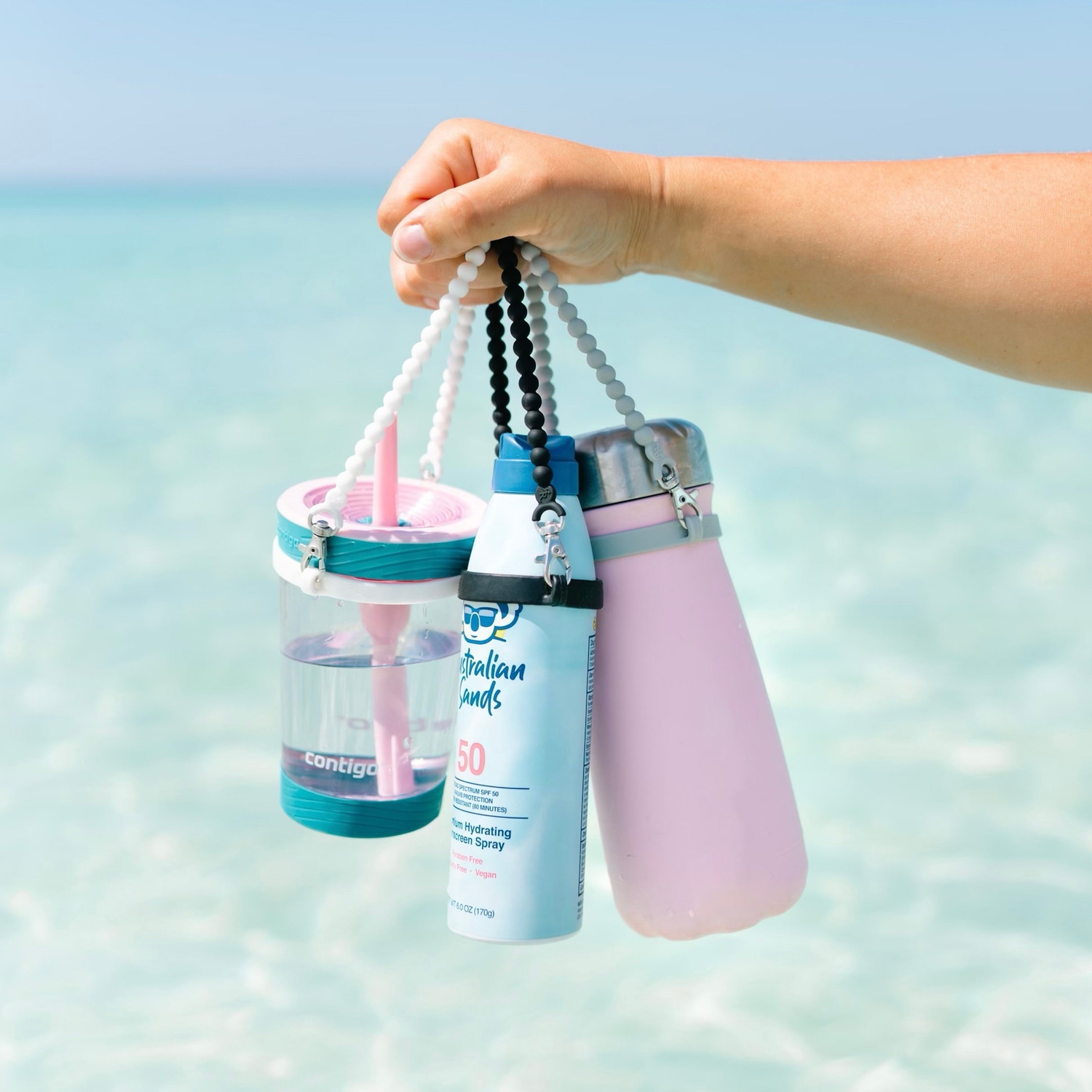 Woman holding water bottles