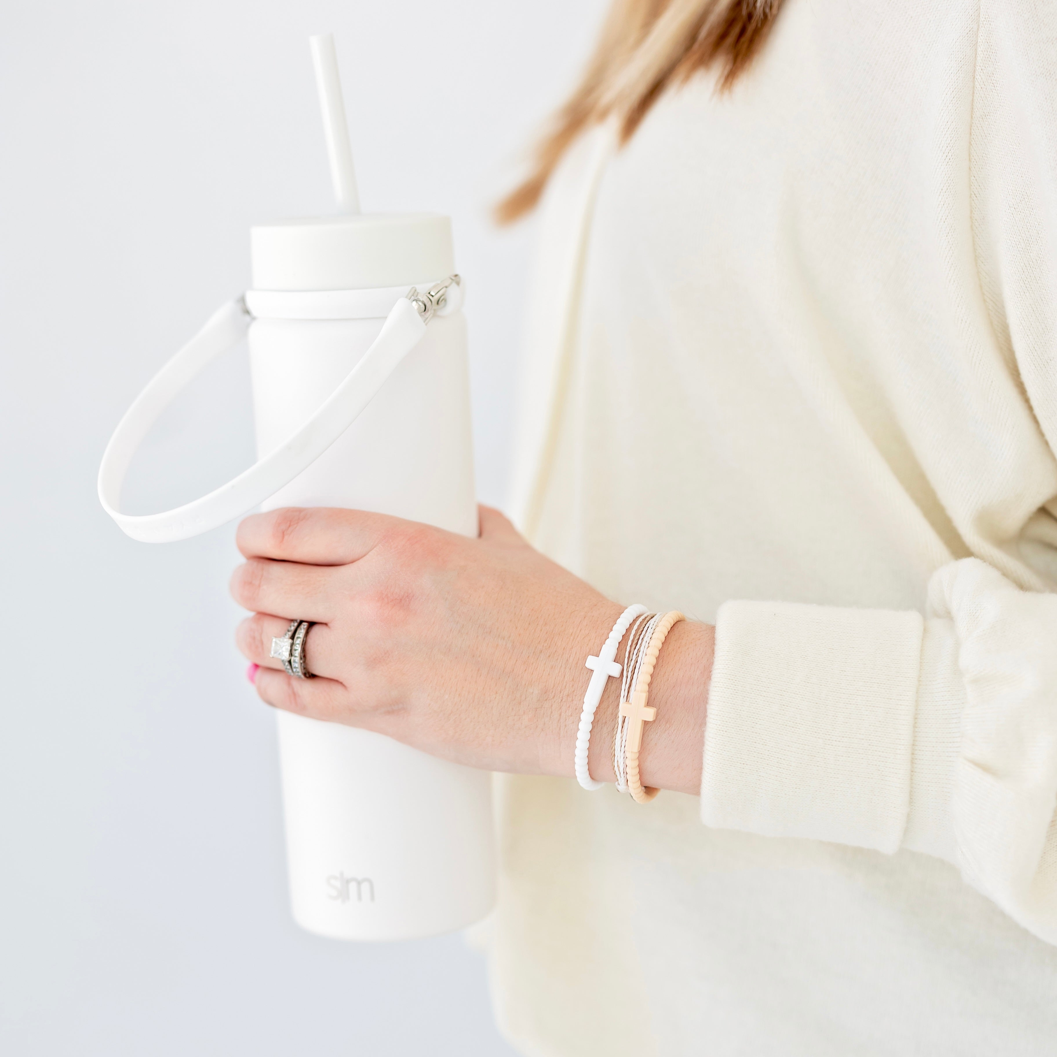Woman holding a water bottle