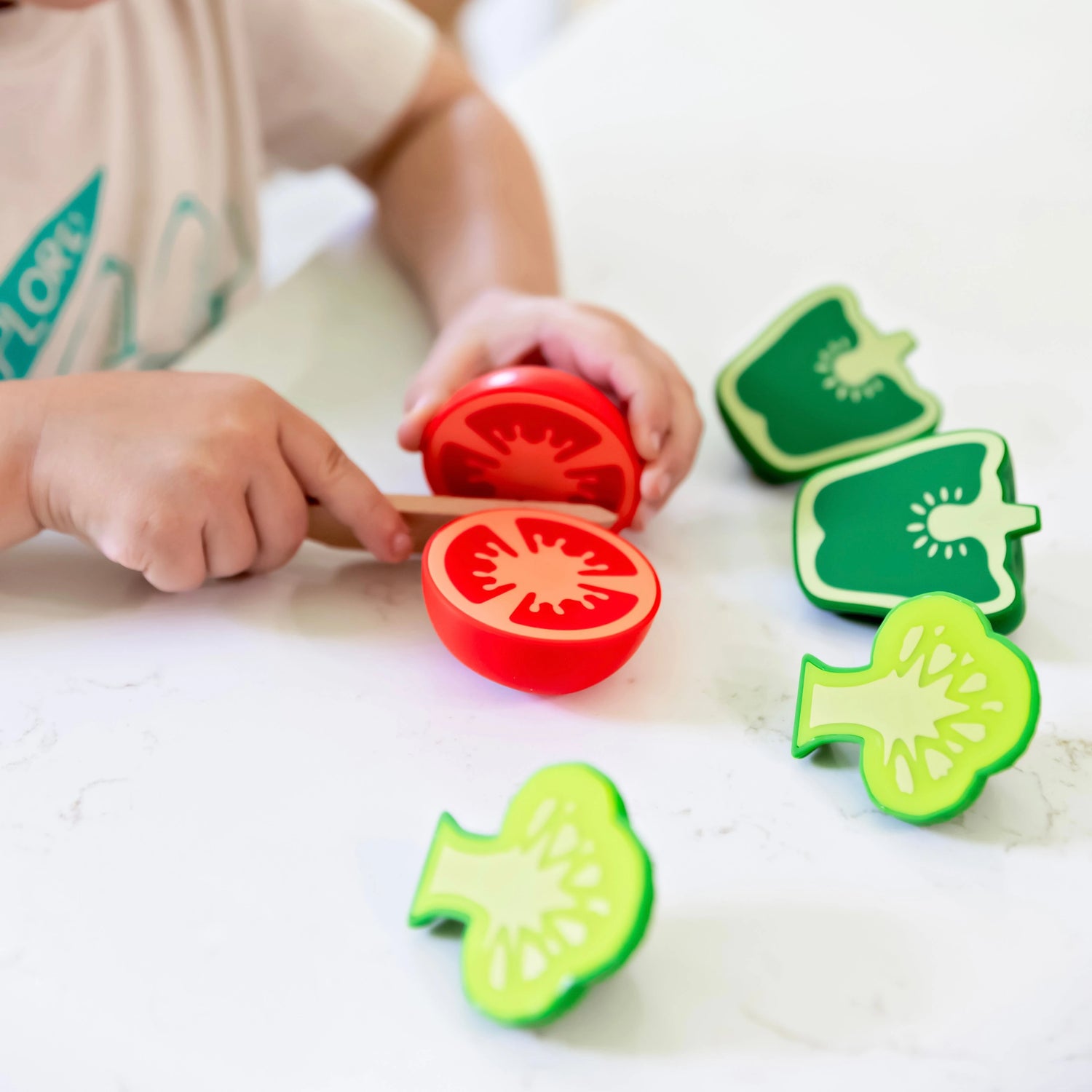 Boy playing with play food