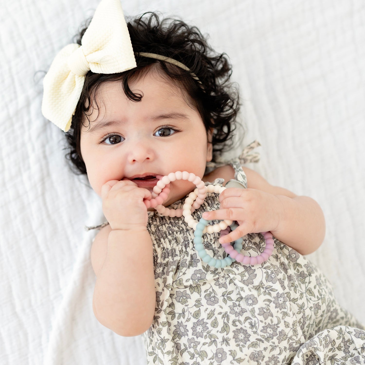 Baby with cutie clinks