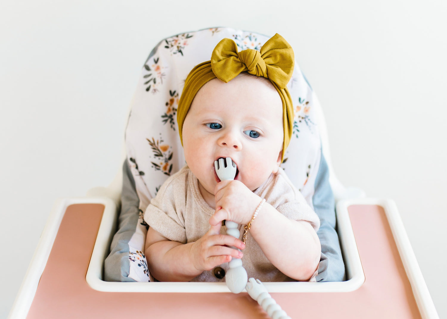 Baby using Cutie Tensils
