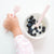 Cutie Spoovels and bowl of yogurt with blueberries on top.