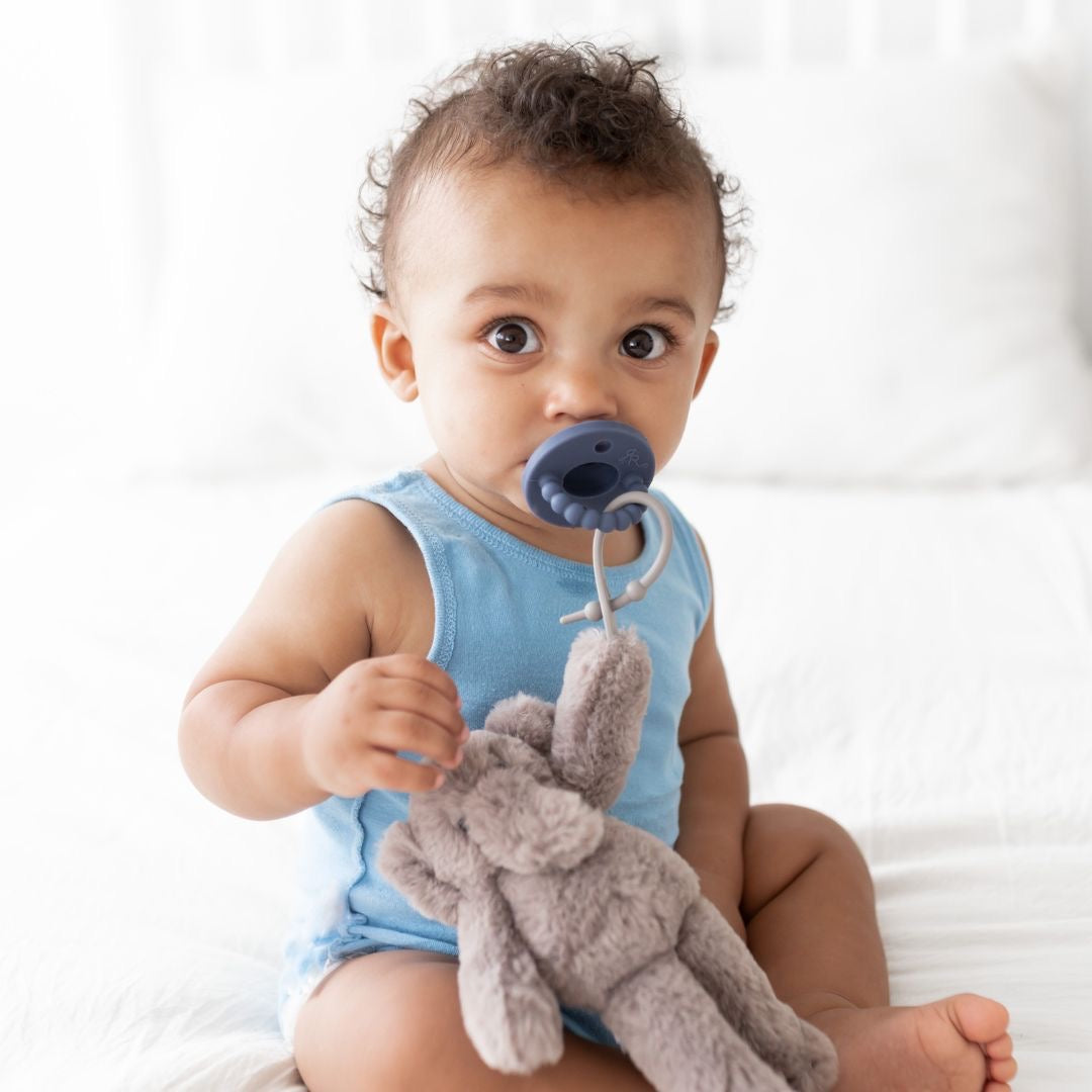 Baby using a Captain Cutie PAT attached to an Elephant Cutie Cuddle.