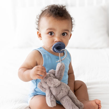 Baby using a Captain Cutie PAT attached to an Elephant Cutie Cuddle.