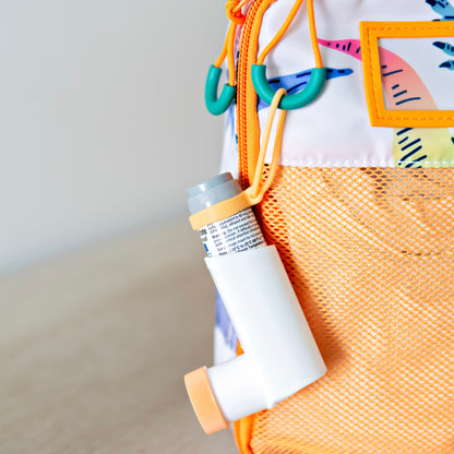 Lip balm holder on inhaler