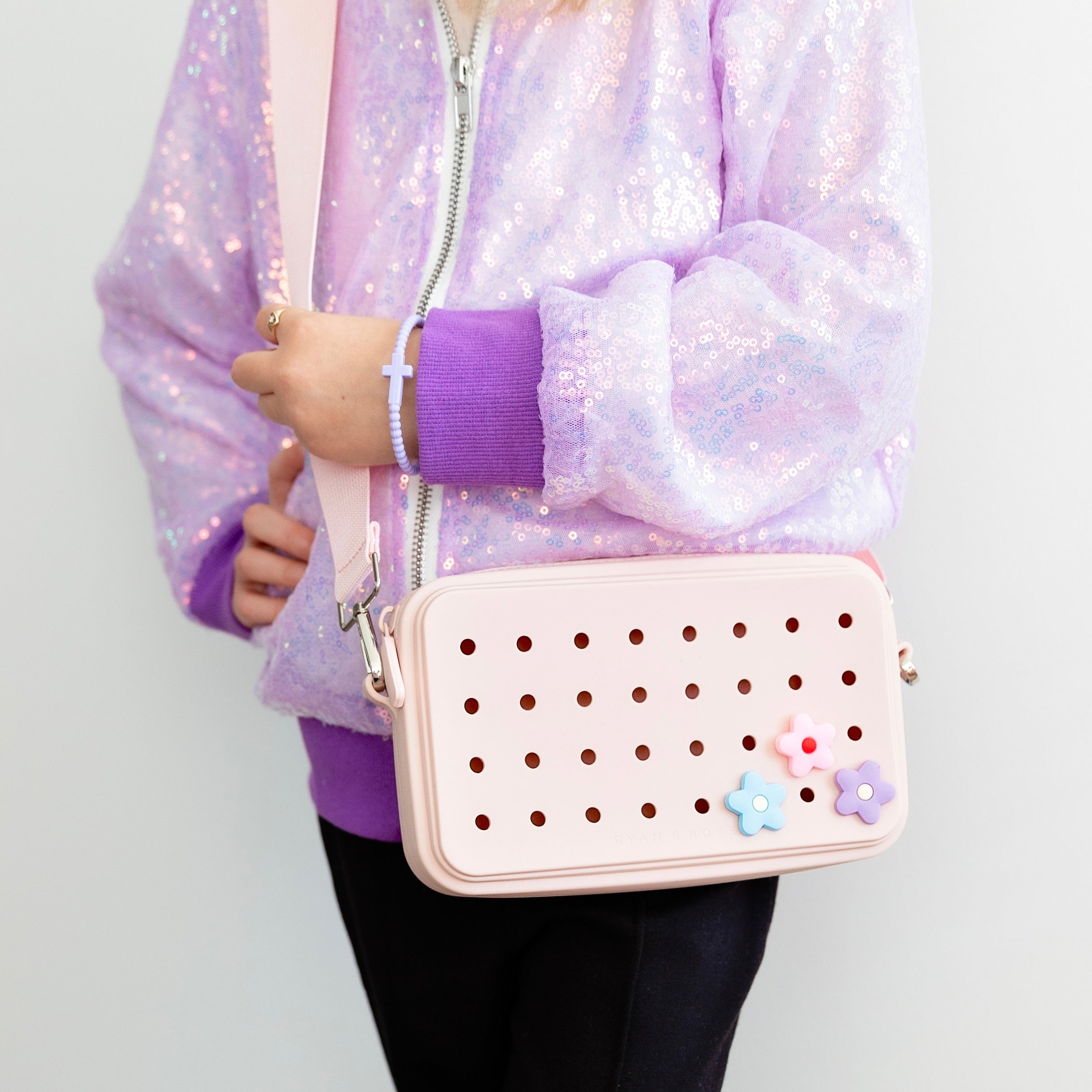 Girl wearing charm purse