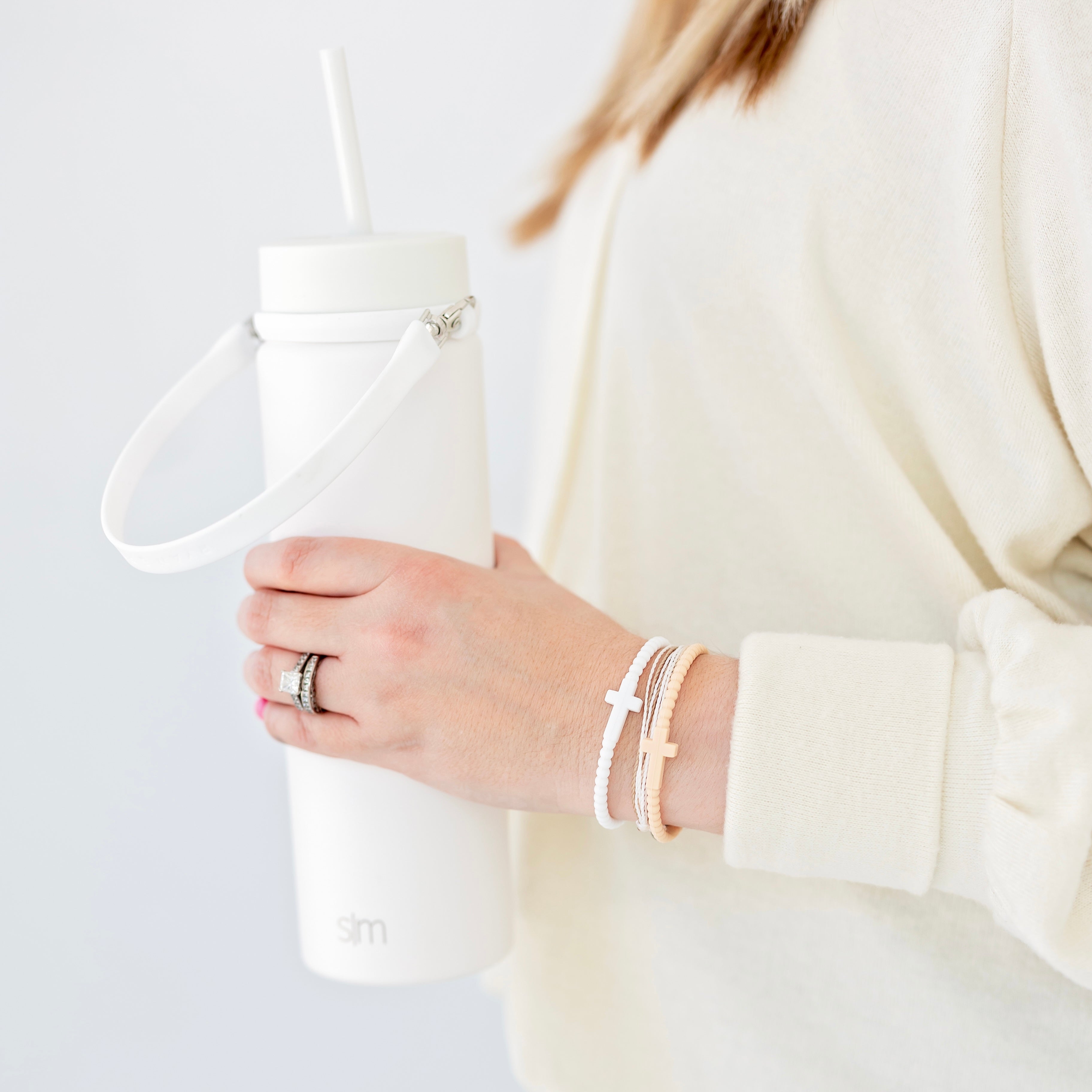 Woman holding a water bottle