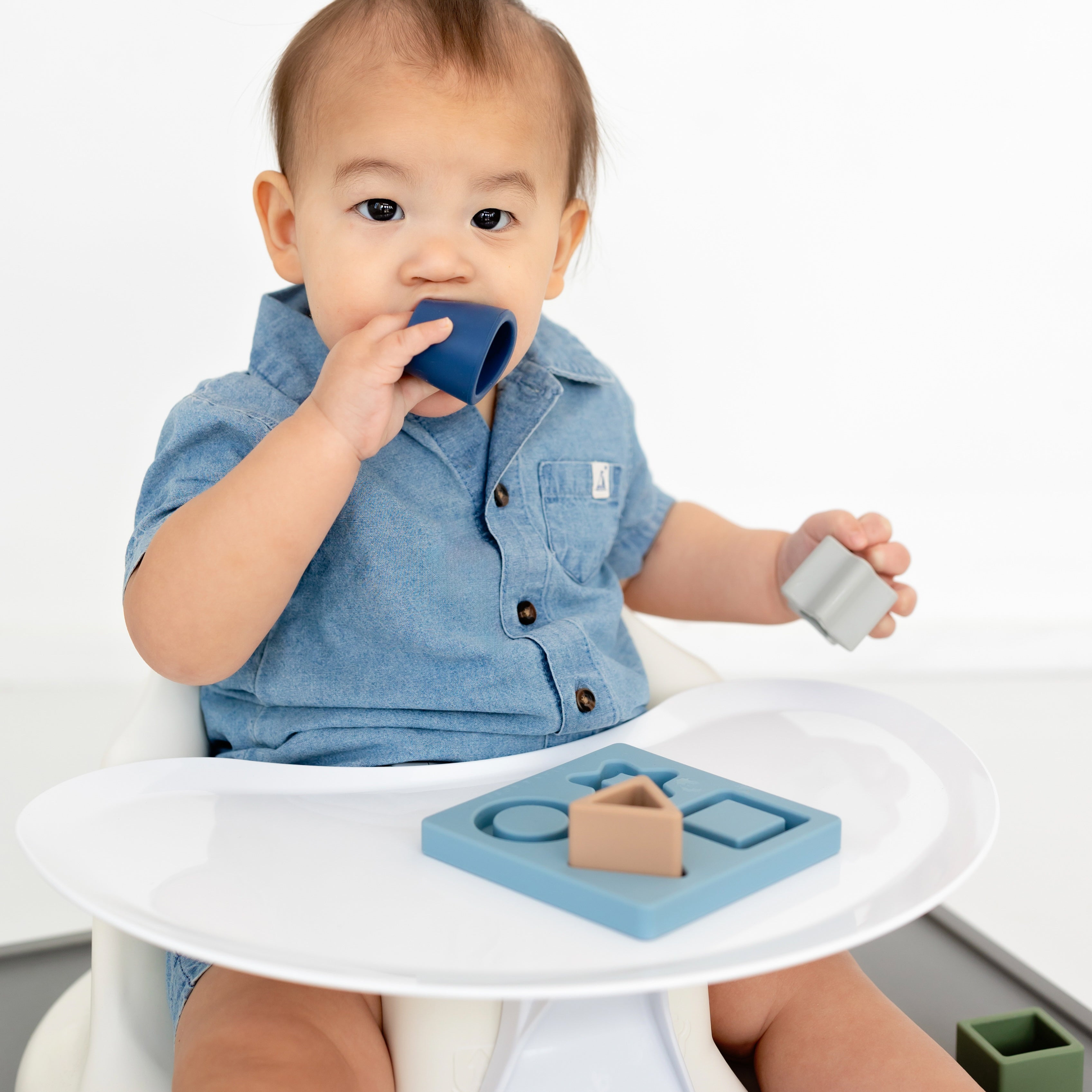 Baby playing with puzzle