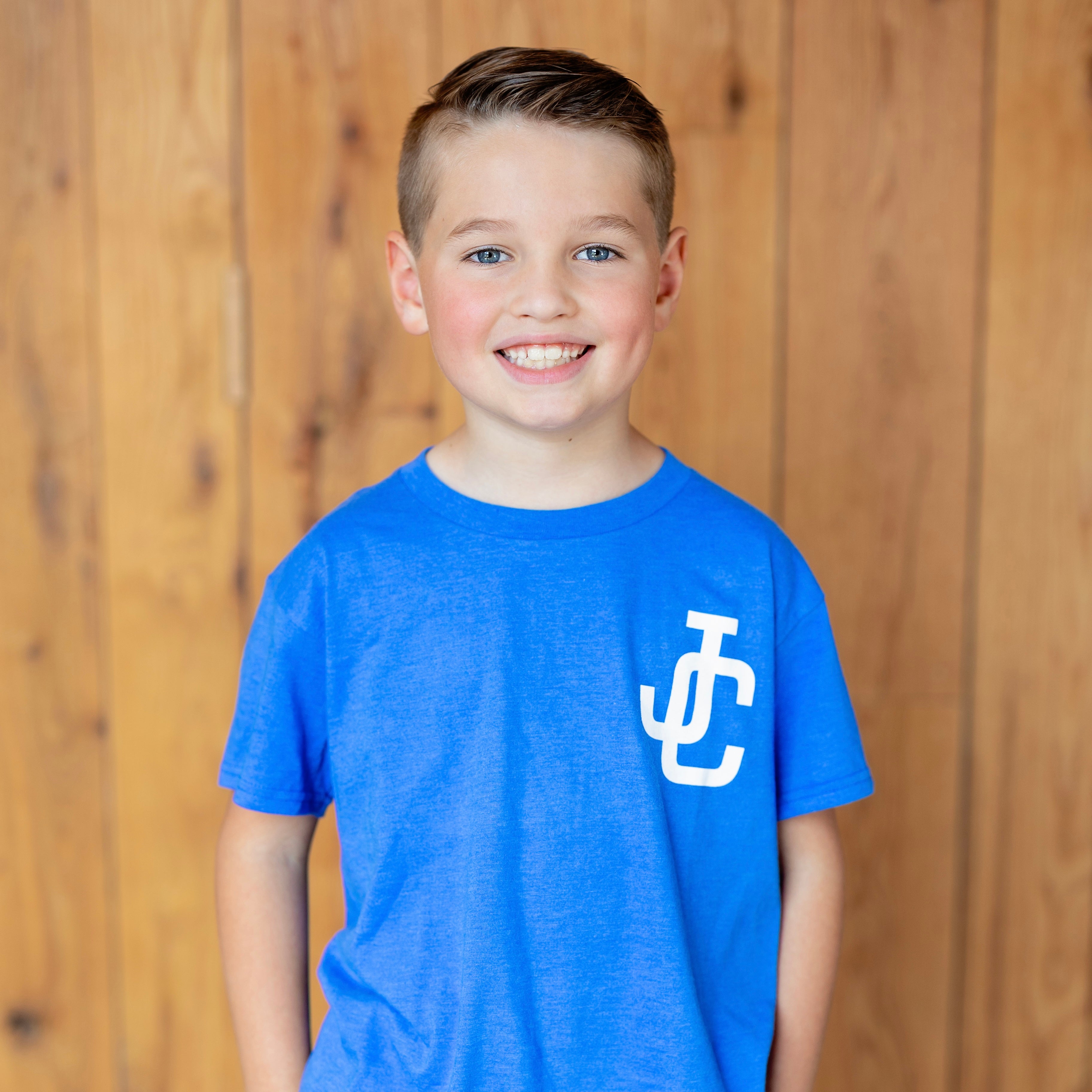 Child wearing JC shirt