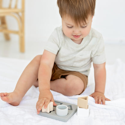 Baby playing with puzzle