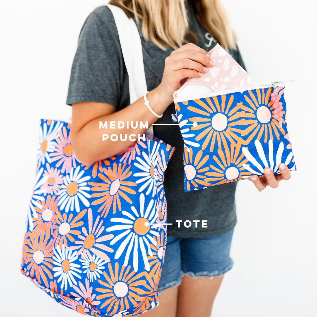 Woman with a Cutie Tote and Medium Cutie Pouch. 
