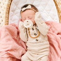 Baby using a Ruby Cutie Clip attached to a Cutie PAT Slant. 