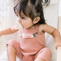 Baby using a Shiloh Cutie Clip attached to a Cutie PAT.