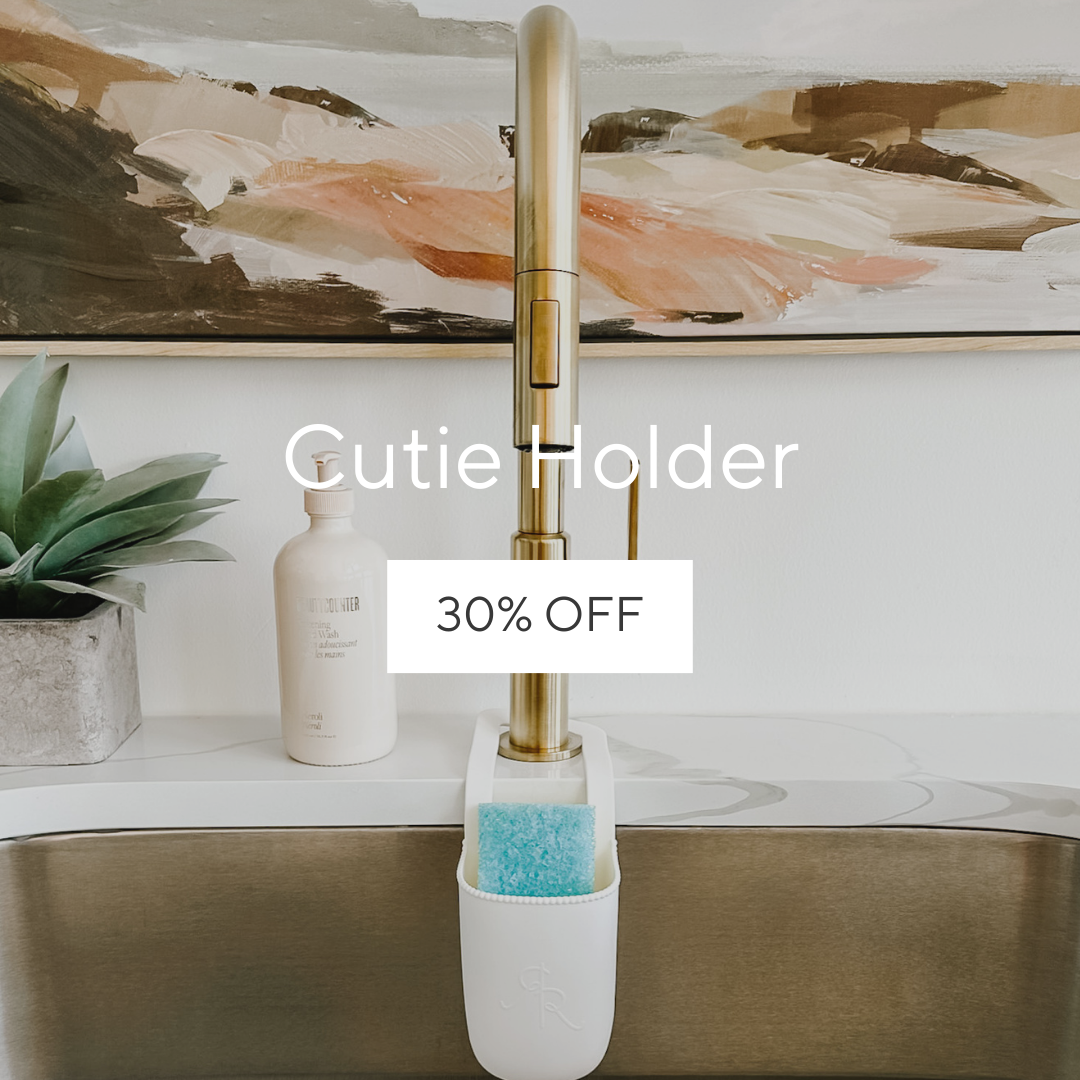 Cutie Holder on a kitchen sink faucet.