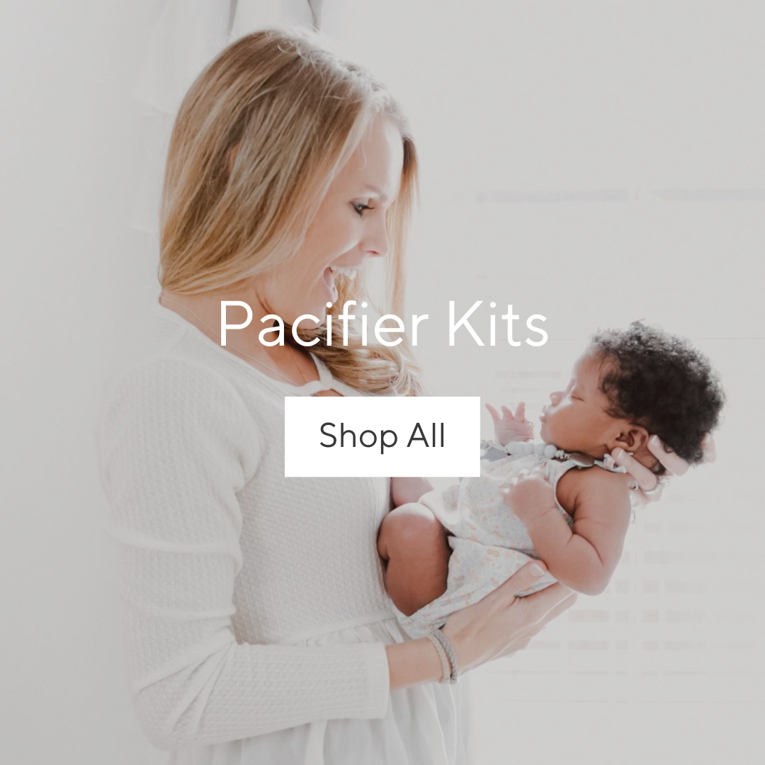 Woman holding a newborn.