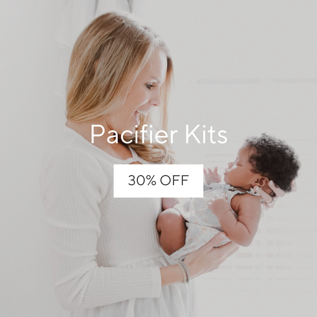 Woman holding a newborn.