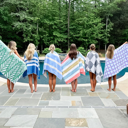 Kids with beach towels