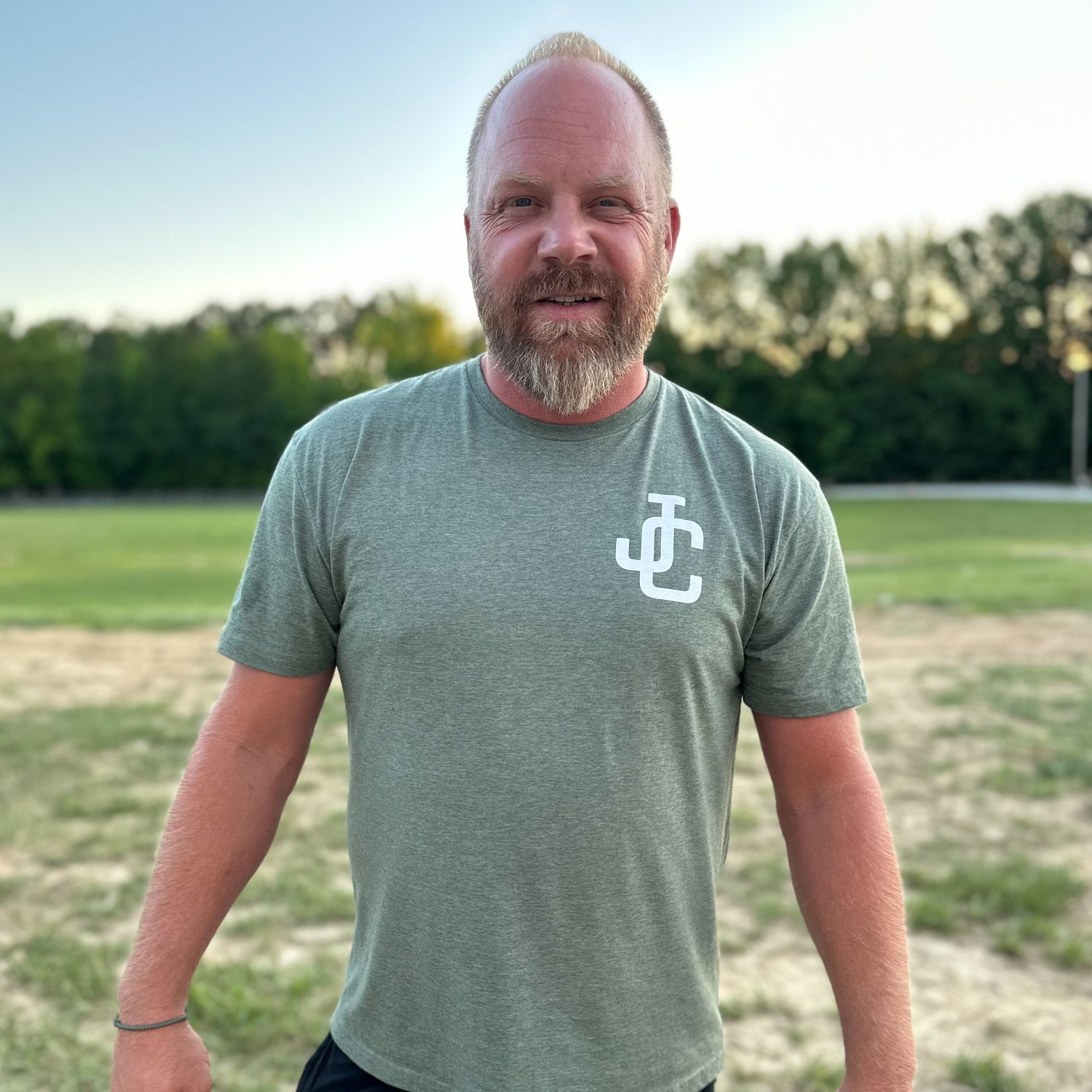 Man modeling JC shirt