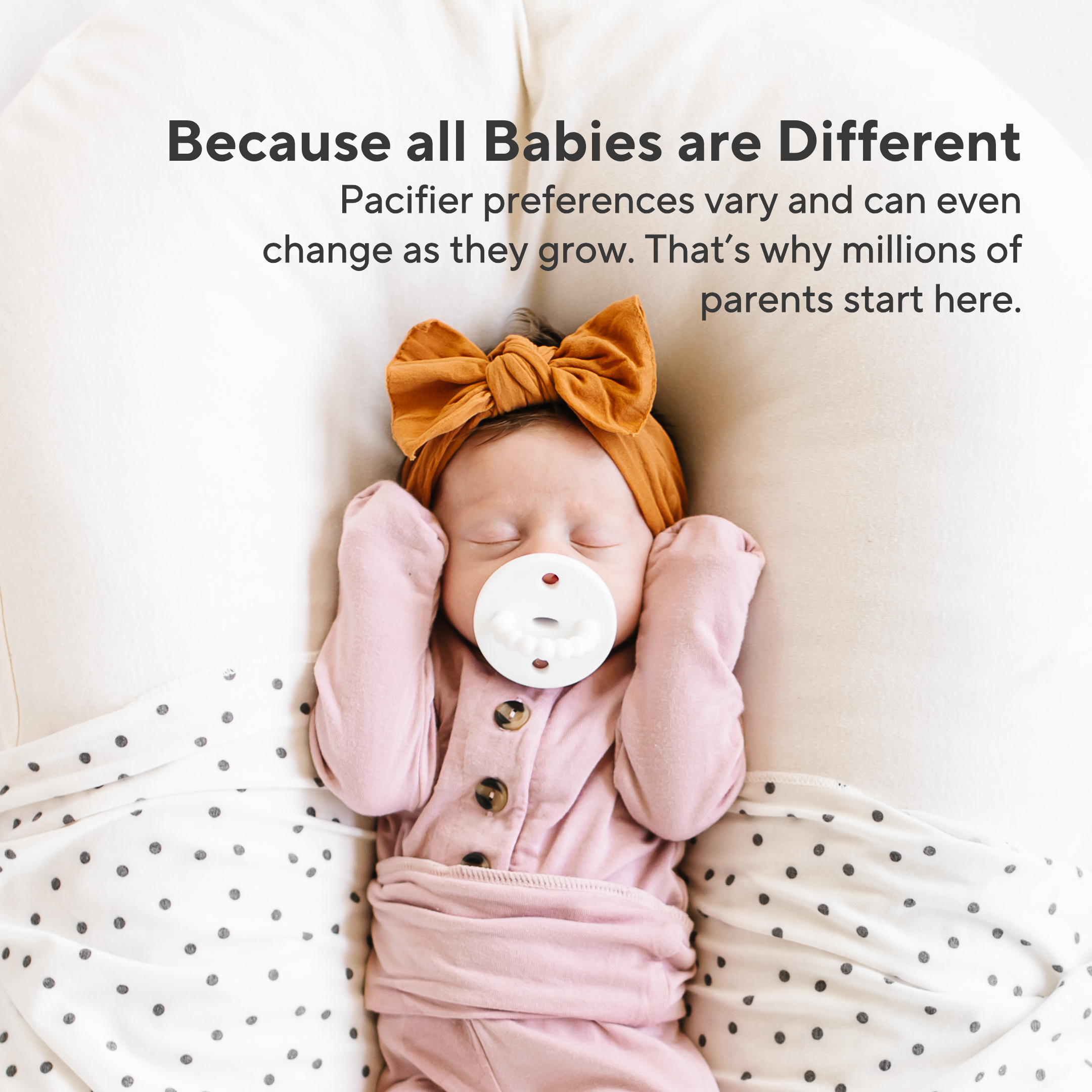 Baby sucking on pacifier