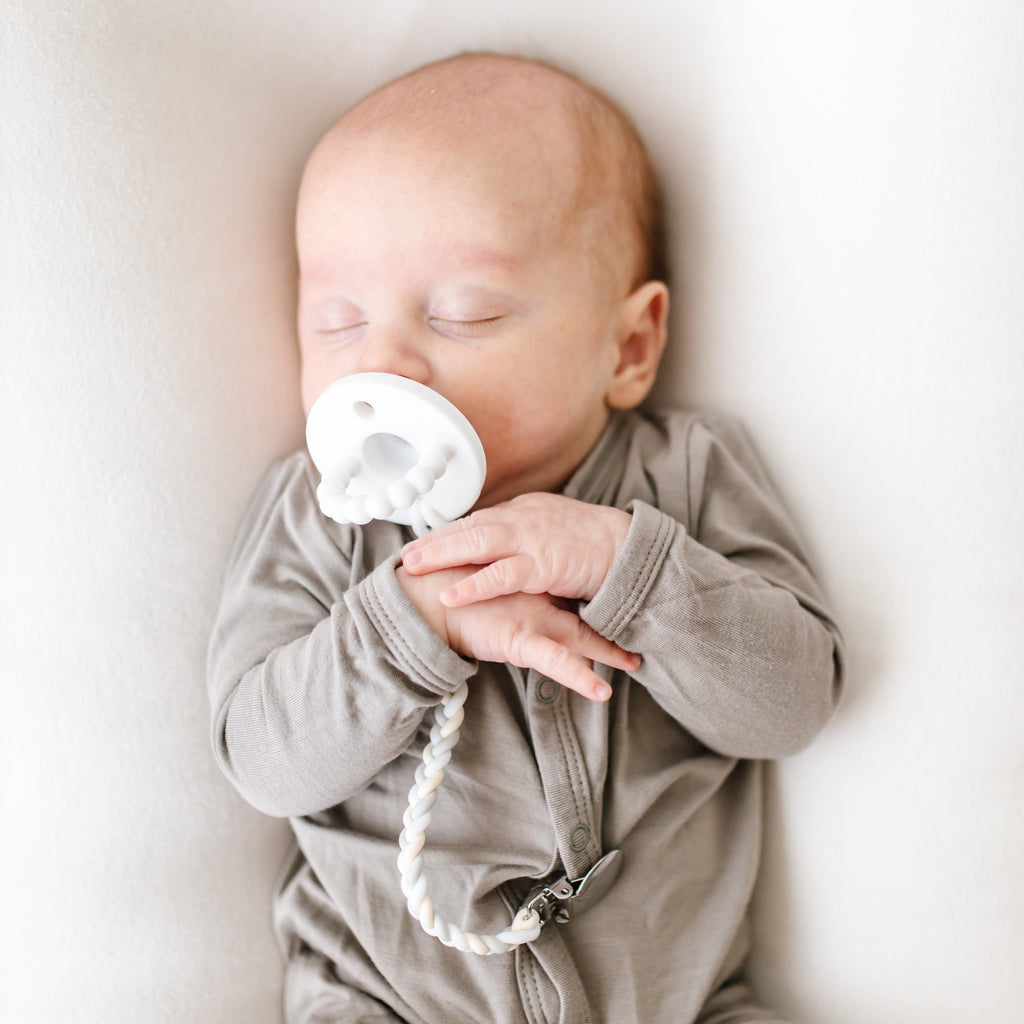 Baby using White Cutie PAT Round.