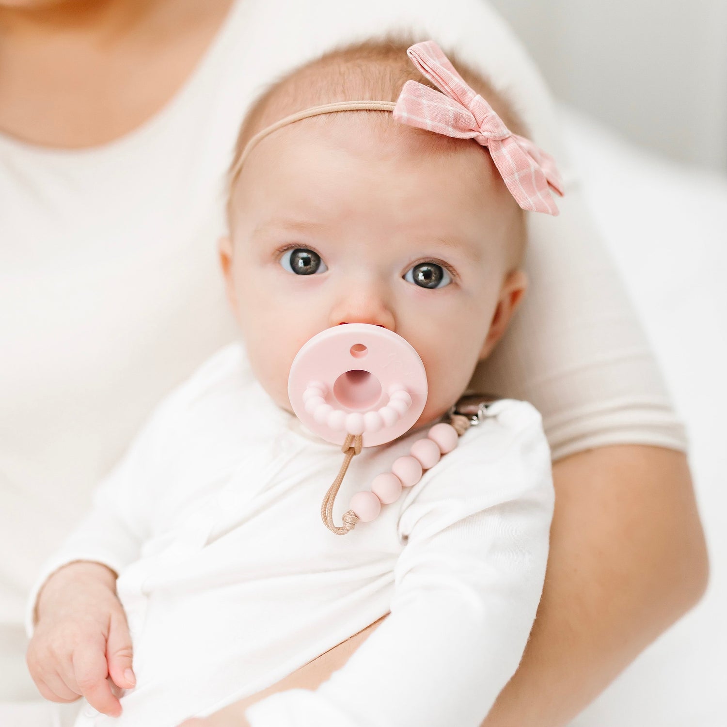 Baby using Pink Cutie PAT Round.